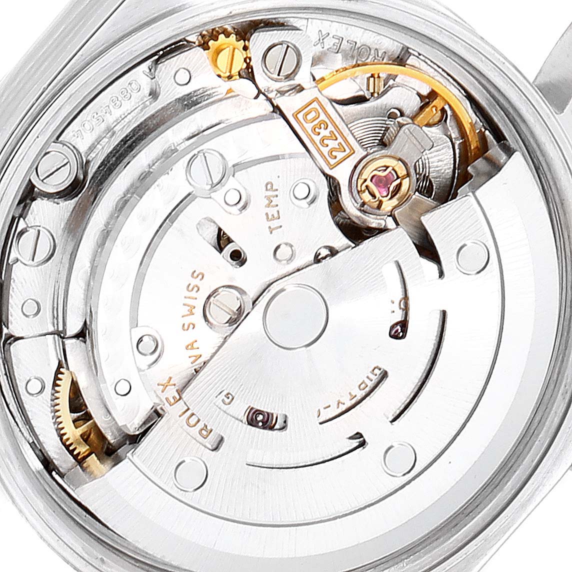 This image shows the internal mechanism and movement of a Rolex Oyster Perpetual 76080 Women
s Stainless Steel Blue Dial 76080 Women
s Stainless Steel Blue Dial watch from a close-up angle.