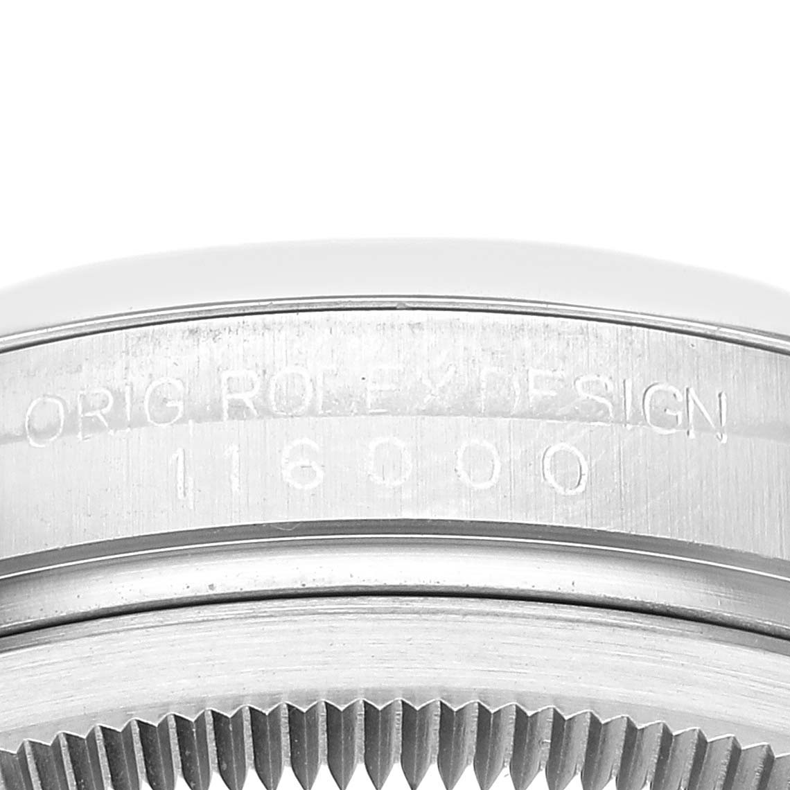 This close-up image shows the side view of the bezel and case of a Rolex Oyster Perpetual 116000 Men's Stainless Steel Silver Dial 116000 Men's Stainless Steel Silver Dial with the model number 116000.