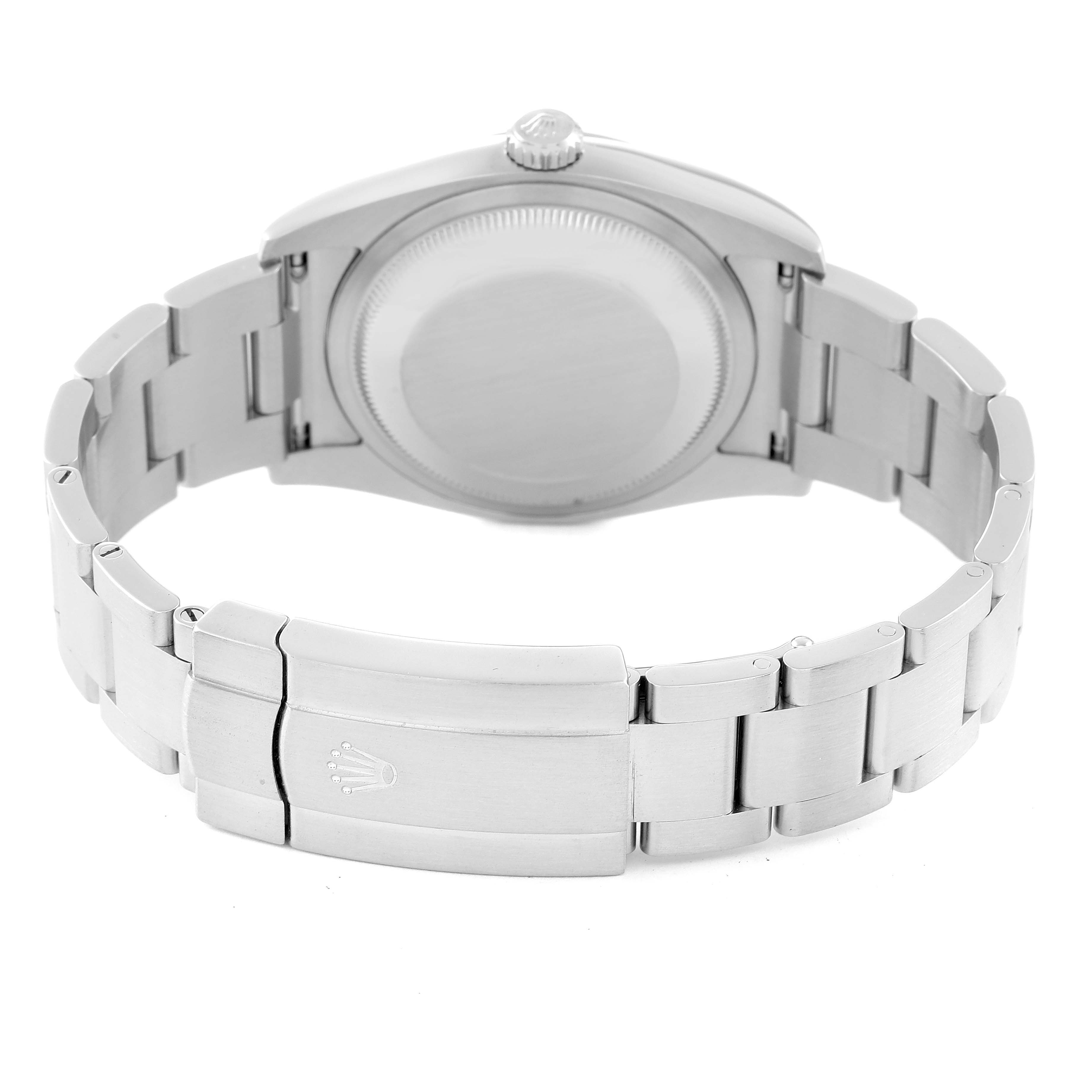 The image shows the backside view of a Rolex Oyster Perpetual 116000 Men's Stainless Steel Silver Dial 116000 Men's Stainless Steel Silver Dial watch, focusing on its closed clasp and case back.