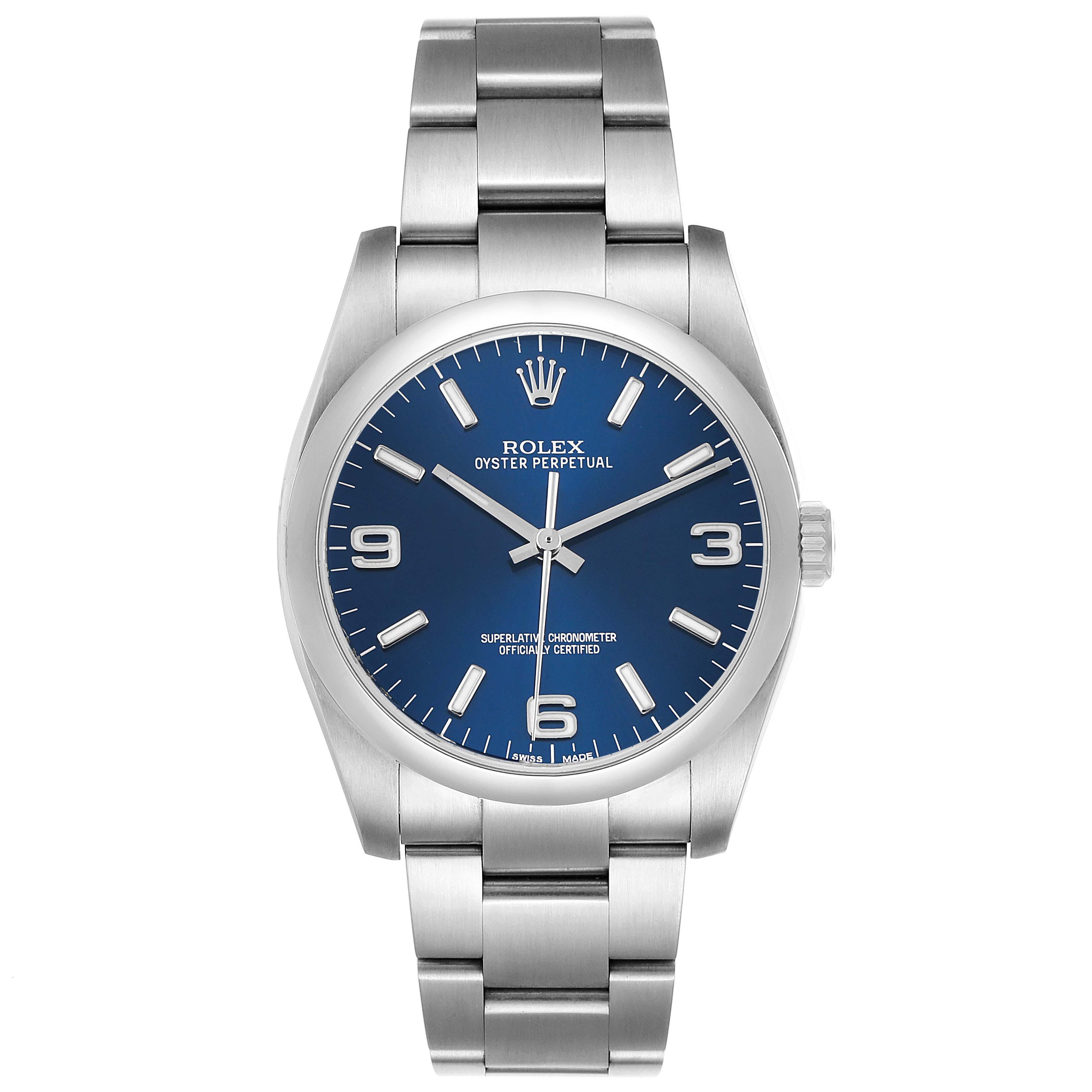 The image shows a front view of the Rolex Oyster Perpetual 116000 Men's Stainless Steel Blue Dial watch, highlighting its blue dial and stainless steel bracelet.