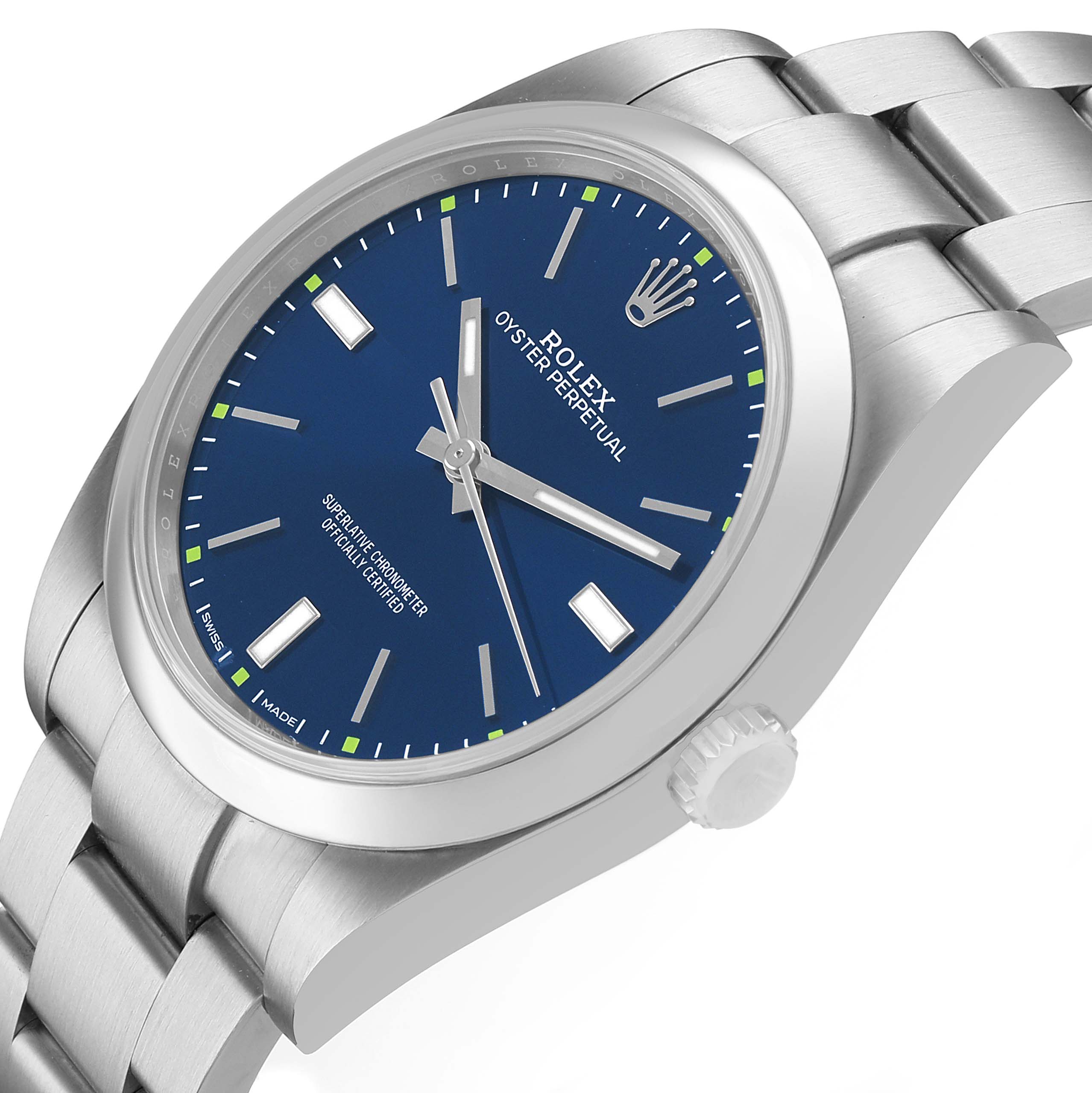 The Rolex Oyster Perpetual 114300 Men's Stainless Steel Blue Dial is shown at a slight angle, highlighting the blue dial, bezel, crown, and stainless steel bracelet.