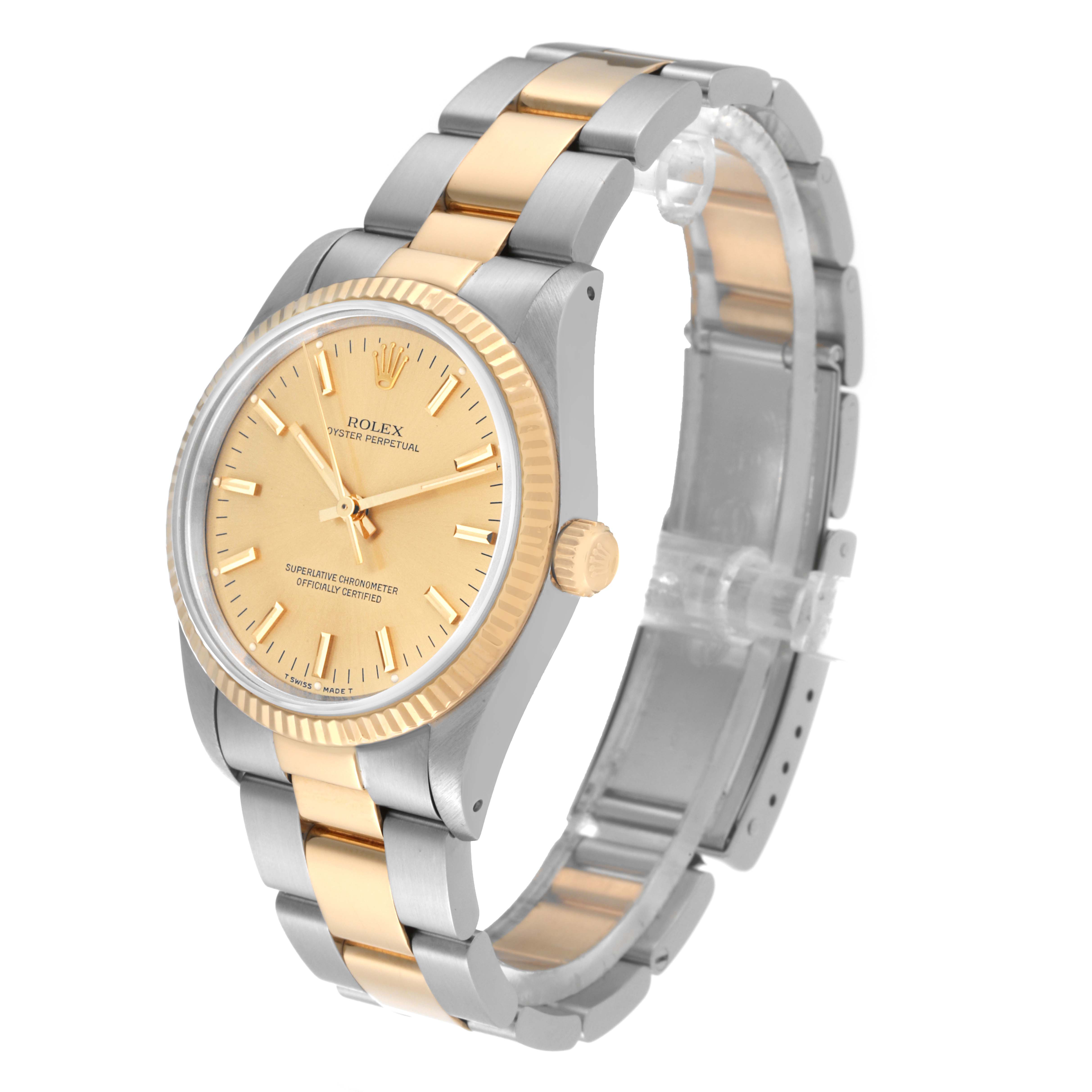 The image shows a Rolex Oyster Perpetual 14233 Men's Steel and Gold (two tone) Champagne Dial 14233 Men's Steel and Gold (two tone) Champagne Dial watch at a slightly tilted side angle, highlighting its two-tone stainless steel and gold bracelet, bezel, and dial.