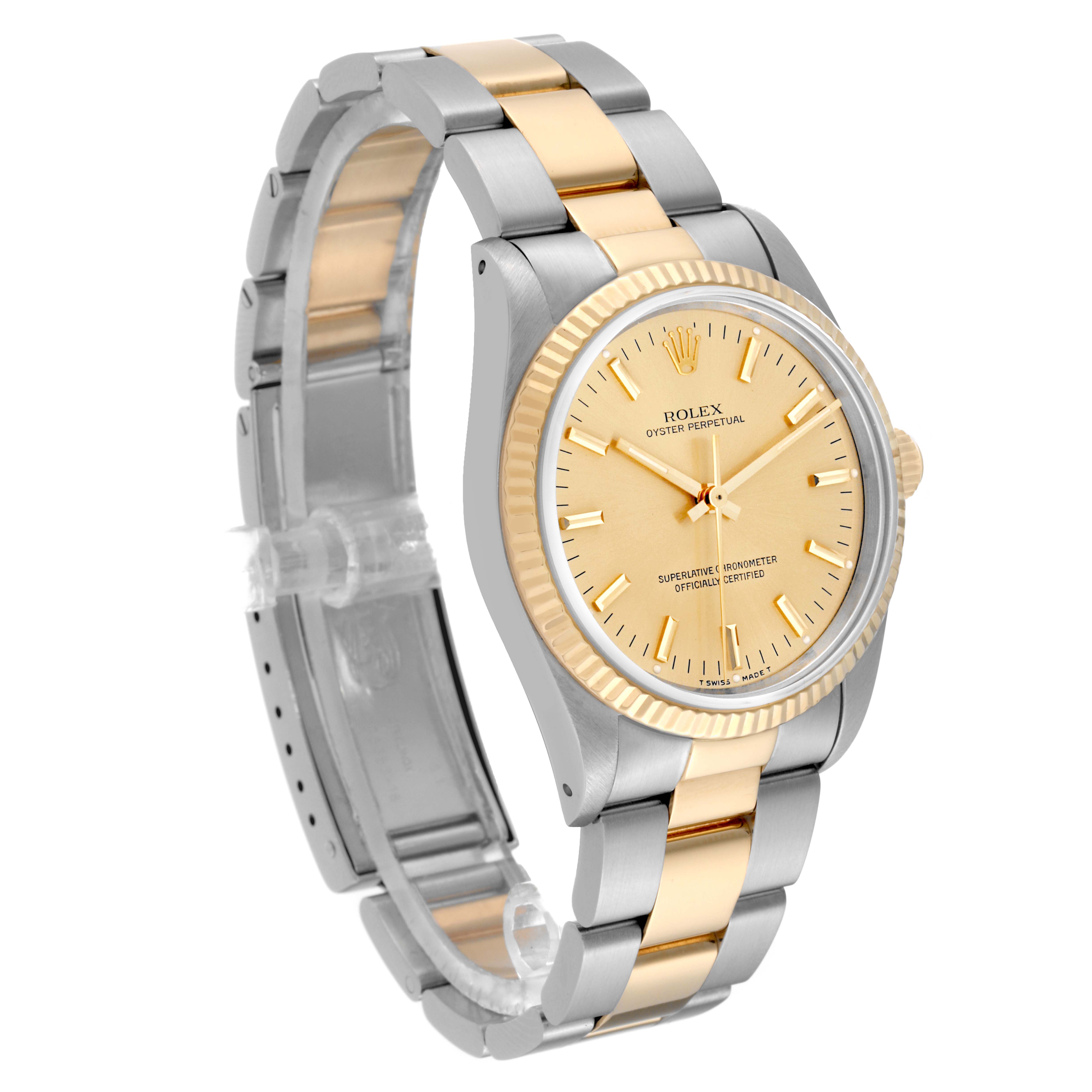 The image shows a Rolex Oyster Perpetual 14233 Men's Steel and Gold (two tone) Champagne Dial 14233 Men's Steel and Gold (two tone) Champagne Dial watch at a three-quarter angle, highlighting its gold dial, bezel, and two-tone bracelet.