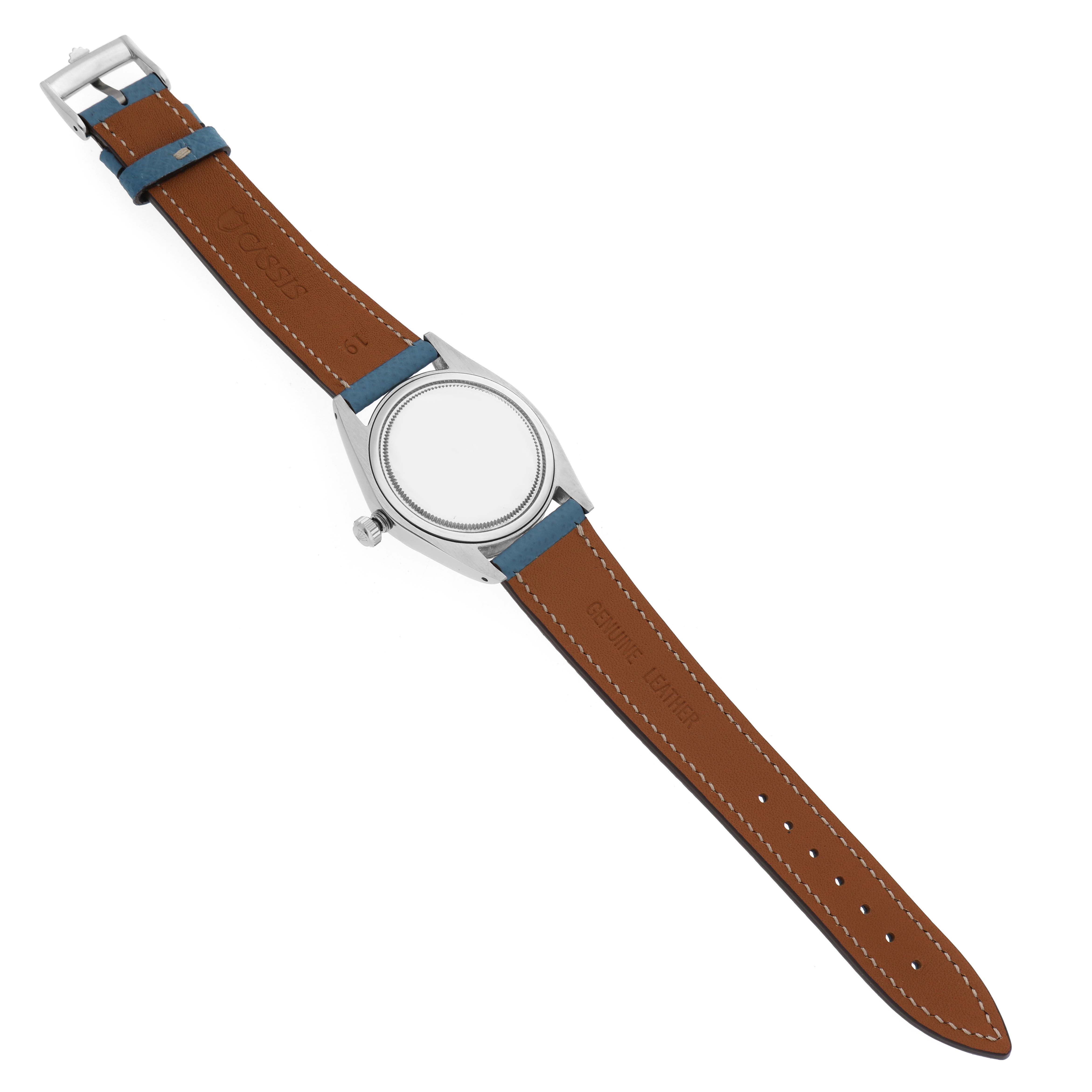 The image shows the back view of a Vintage Collection Rolex watch with a brown leather strap and a silver case.