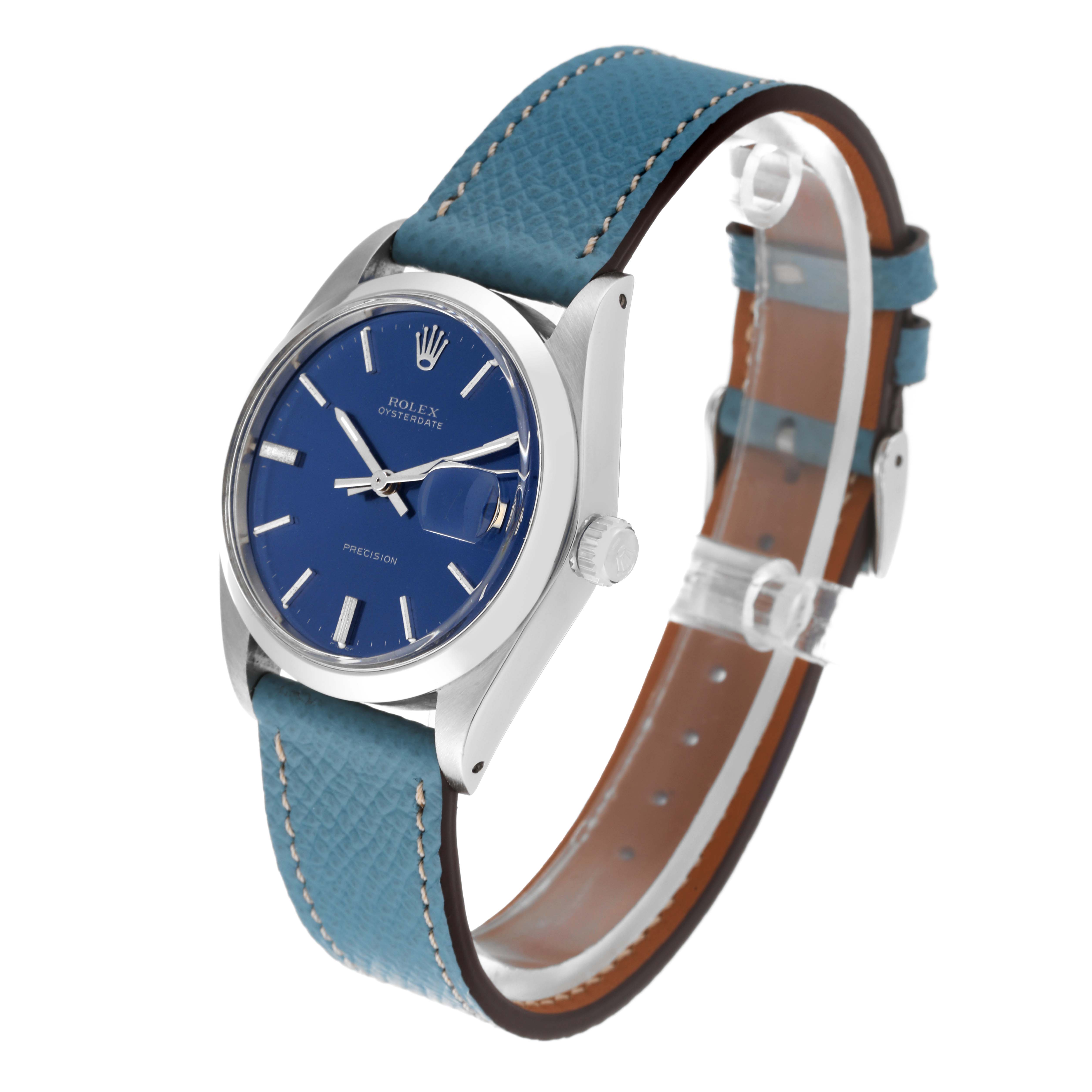 The image shows a Rolex Vintage Collection 6694 Men's Stainless Steel Blue Dial 6694 Men's Stainless Steel Blue Dial watch at a three-quarter angle, highlighting its blue dial, metal case, and blue leather strap.