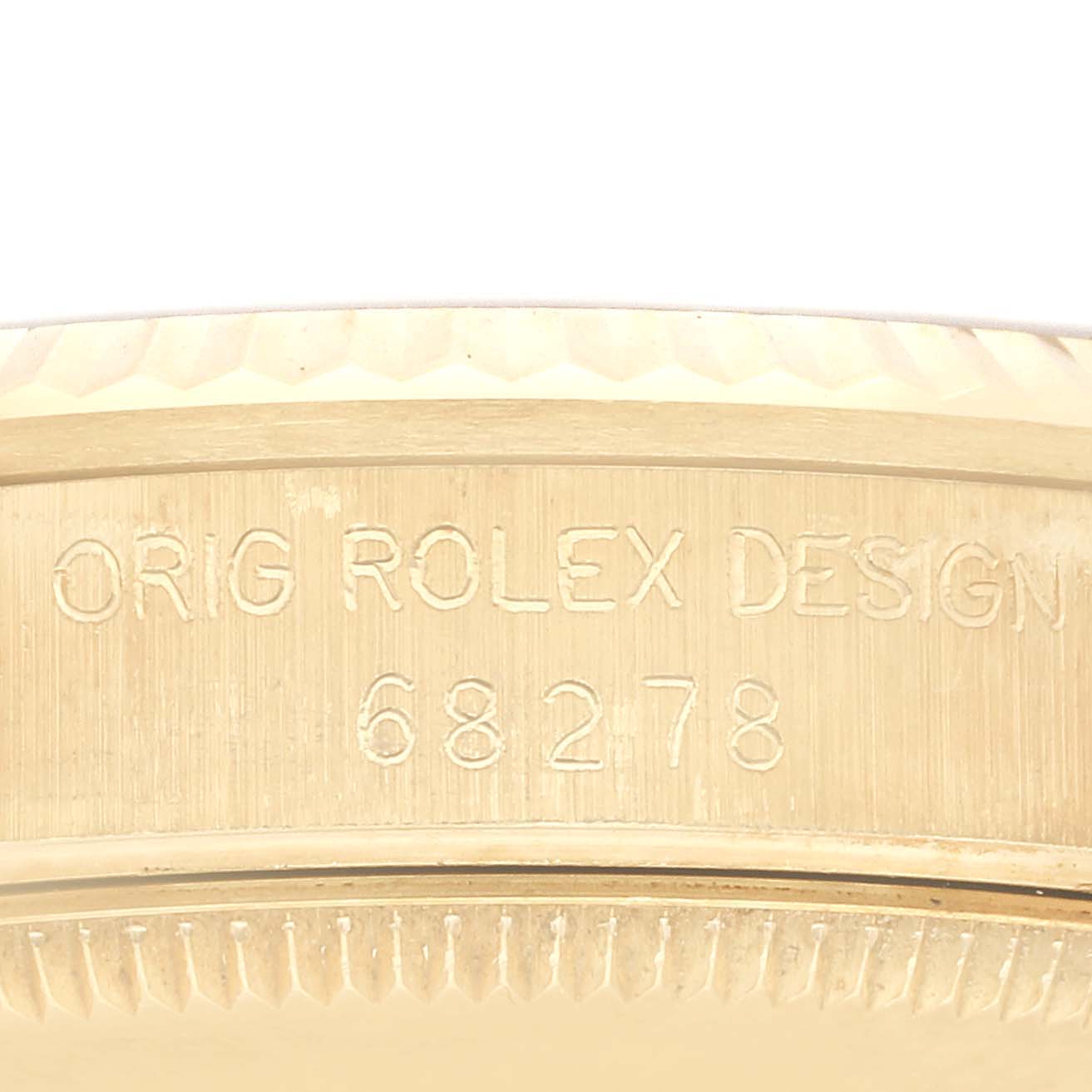 This close-up image shows the engraved model number on the case side of the Rolex President 68278 Women's Yellow Gold Champagne Dial 68278 Women's Yellow Gold Champagne Dial watch.