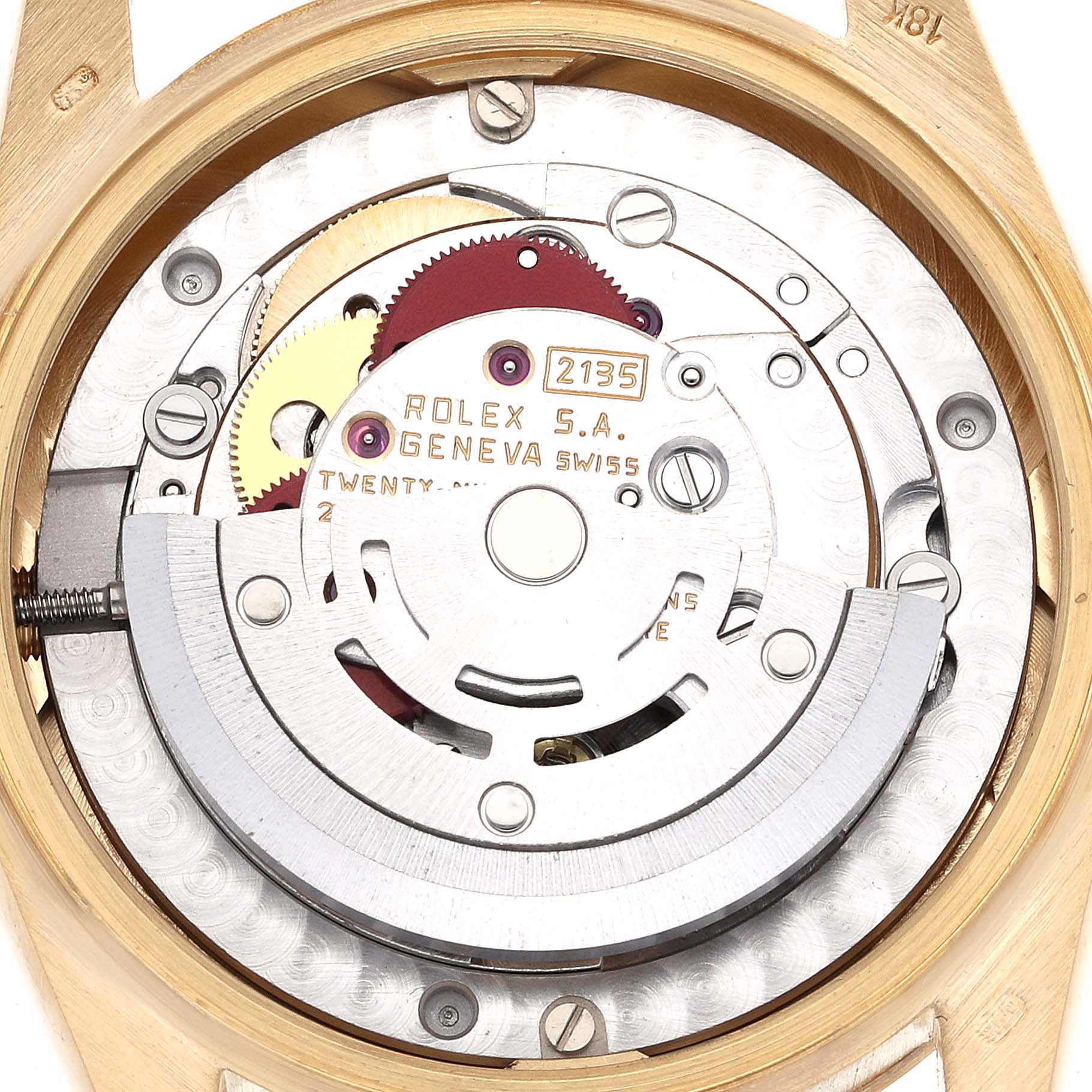 This image shows the intricate inner mechanical movement of a Rolex President 68278 Women
s Yellow Gold Champagne Dial 68278 Women
s Yellow Gold Champagne Dial model watch, focusing on its Rolex S.A. Geneve Swiss 2135 movement.