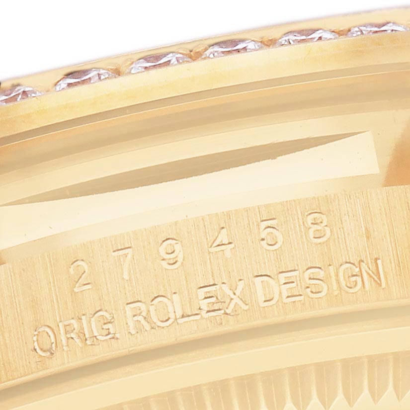 The close-up angle shows the "ORIG ROLEX DESIGN" engraving and part of the bezel on the Rolex President 279458 Women's Yellow Gold Champagne Dial 279458 Women's Yellow Gold Champagne Dial watch.
