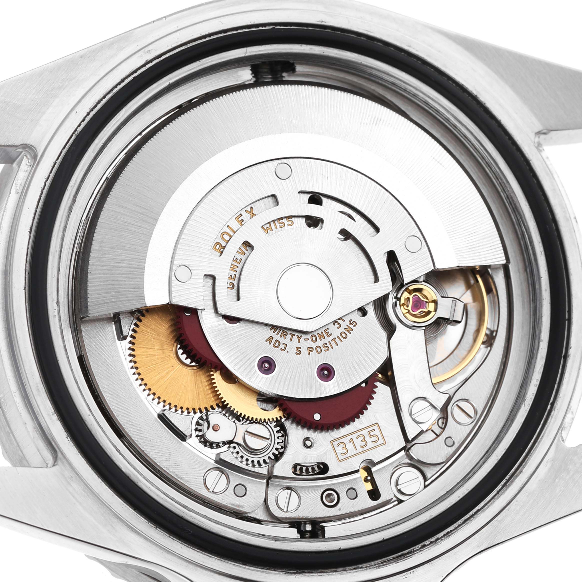 The image shows the movement of a Rolex Sea-Dweller M16600T Men's Stainless Steel Black Dial watch from the back, highlighting gears and the rotor.