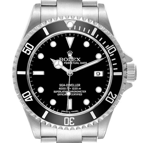 The Rolex Sea-Dweller M16600T Men's Stainless Steel Black Dial watch is shown from a top-down angle, highlighting the dial, bezel, and part of the bracelet.
