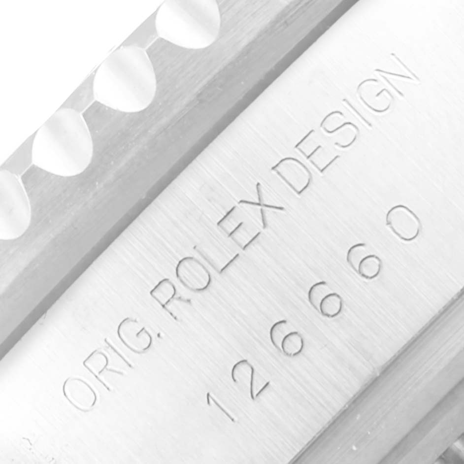 This is a close-up image of the engraved side of the bezel and casing of a Rolex Sea-Dweller 126660 Men
s Stainless Steel Black Dial 126660 Men
s Stainless Steel Black Dial watch.