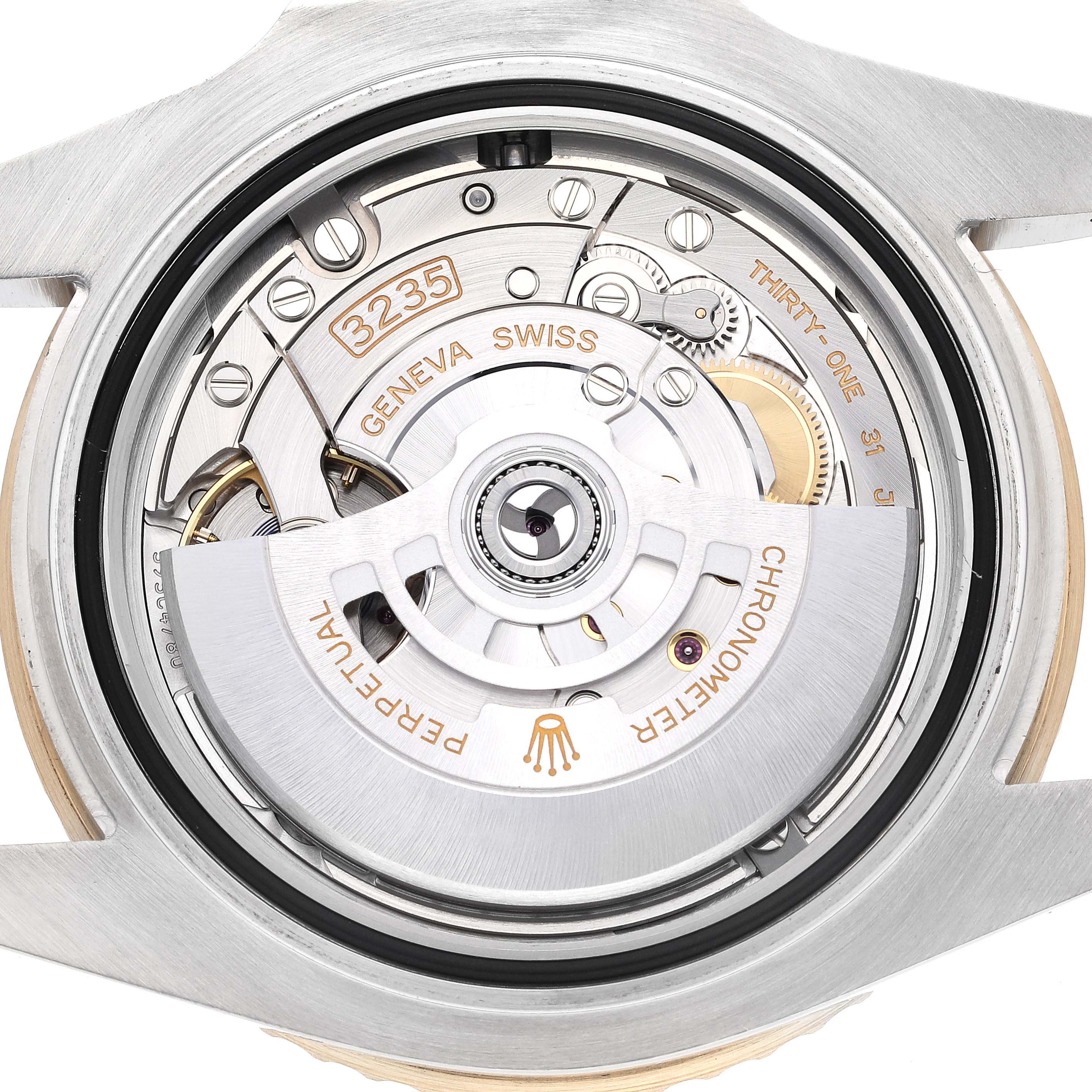 This image shows a close-up of the movement inside a Rolex Submariner M126613LN-0002 Men's Steel and Gold (two tone) Black Dial M126613LN-0002 Men's Steel and Gold (two tone) Black Dial watch, specifically the intricate details of the caliber 3235 movement.