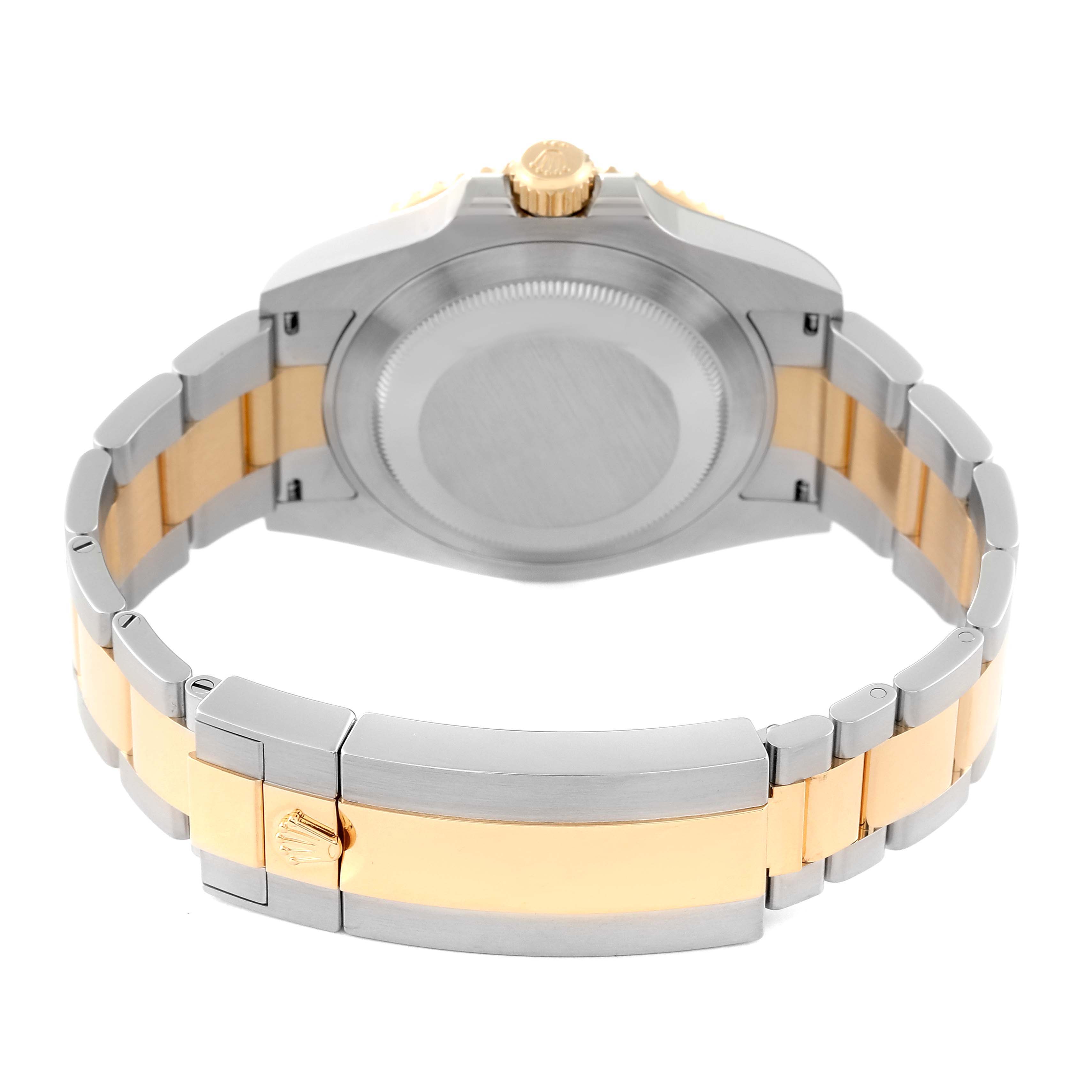 The image shows the back and strap of a Rolex Submariner M126613LN-0002 Men's Steel and Gold (two tone) Black Dial M126613LN-0002 Men's Steel and Gold (two tone) Black Dial watch at an angled rear view.