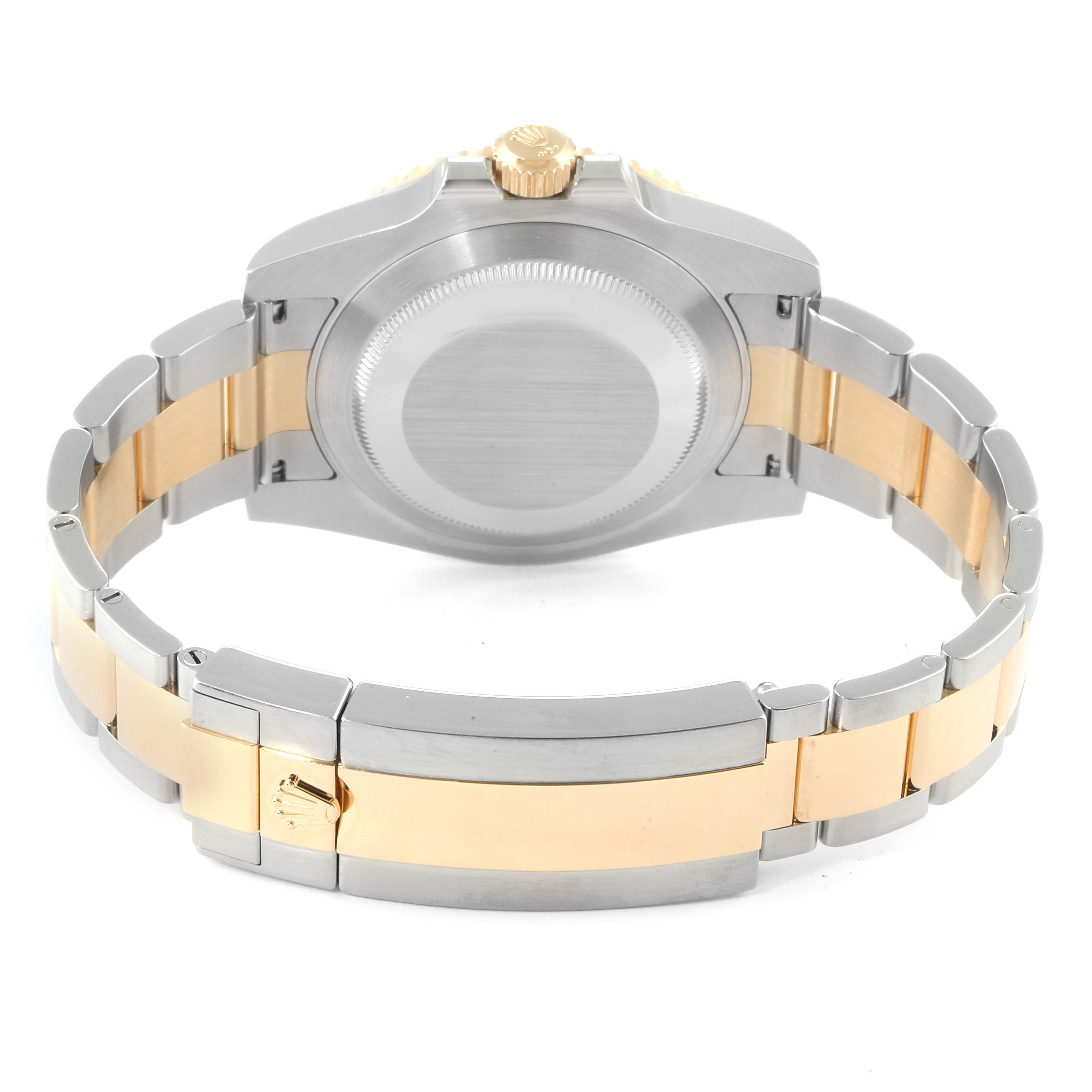 This image shows the back view of a Rolex Submariner 116613 Men's Stainless Steel Blue Dial 116613 Men's Stainless Steel Blue Dial, highlighting its case back and two-tone bracelet.