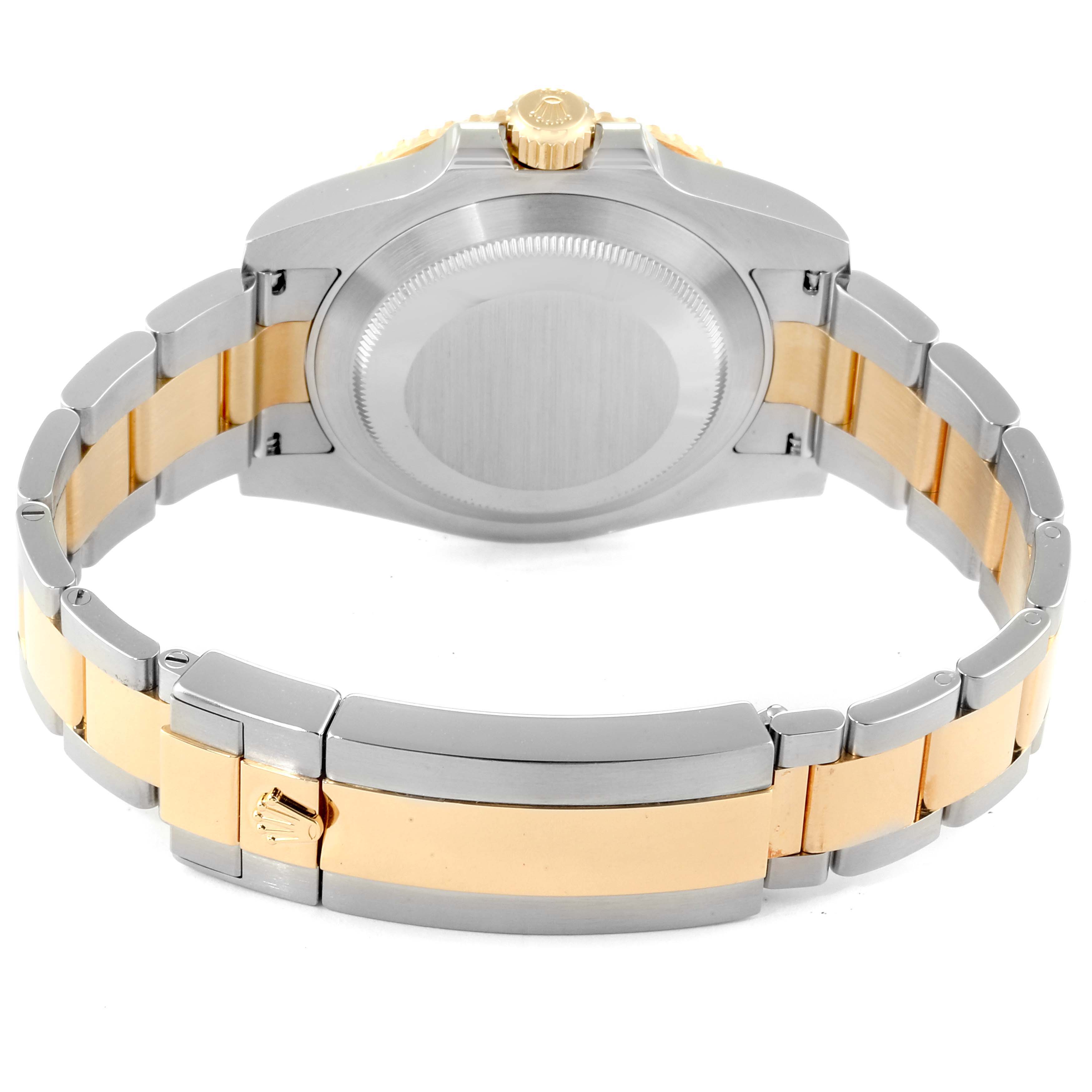 This image shows the back view of a Rolex Submariner 116613 Men
s Stainless Steel Blue Dial 116613 Men
s Stainless Steel Blue Dial watch, highlighting the case back and two-tone bracelet.