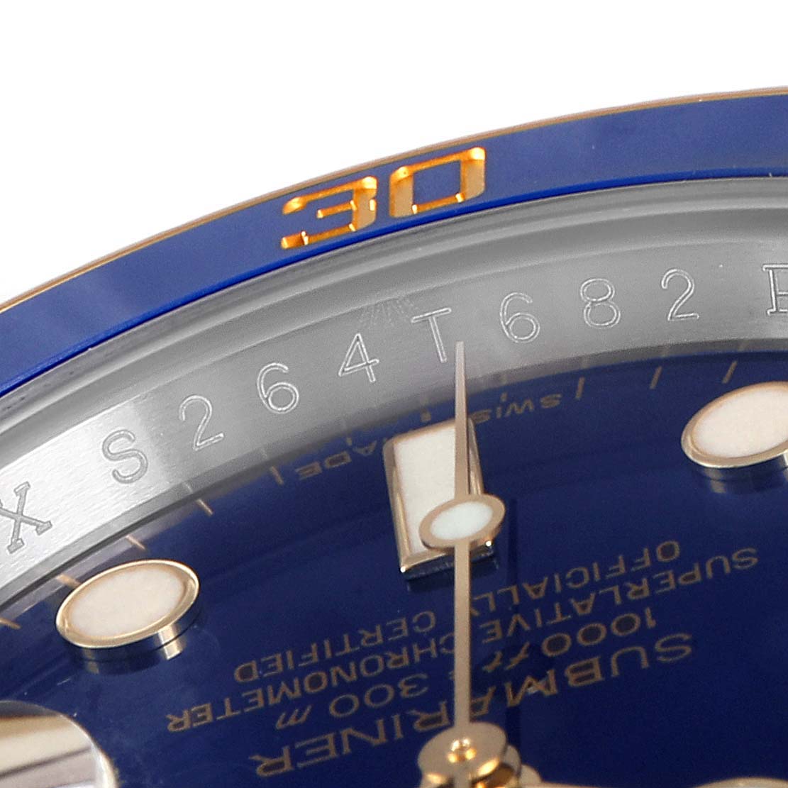 The image shows a close-up angled view of the Rolex Submariner 116613 Men
s Stainless Steel Blue Dial 116613 Men
s Stainless Steel Blue Dial watch, highlighting the bezel, dial, and partial serial number.