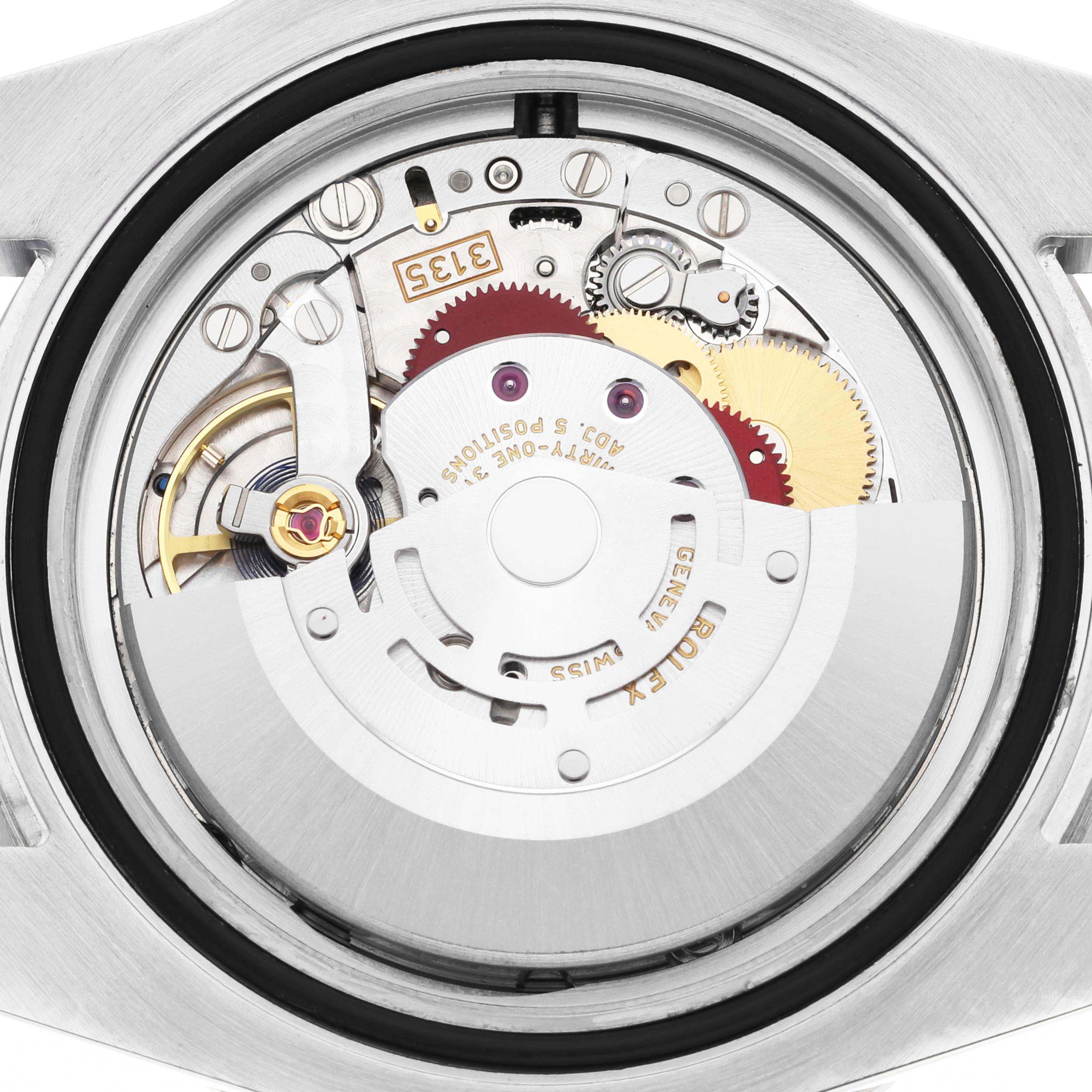This is a close-up view of the movement and inner mechanism of a Rolex Submariner 116610LN Men
s Stainless Steel Black Dial 116610LN Men
s Stainless Steel Black Dial watch.