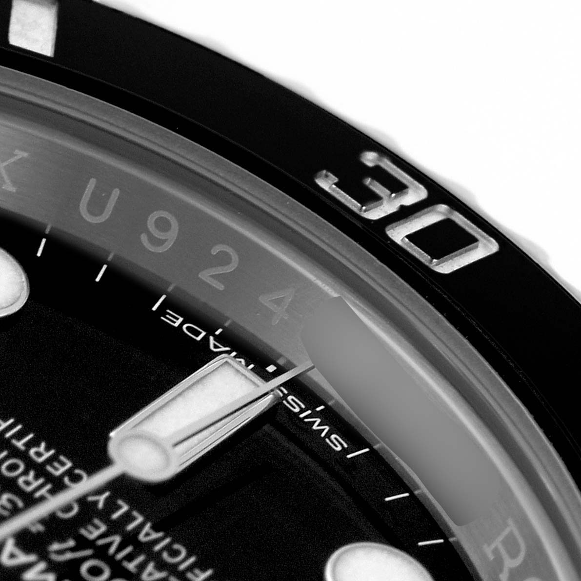 The image shows a close-up of the bezel and a portion of the dial of a Rolex Submariner 116610LN Men's Stainless Steel Black Dial, highlighting the 30-minute marker.