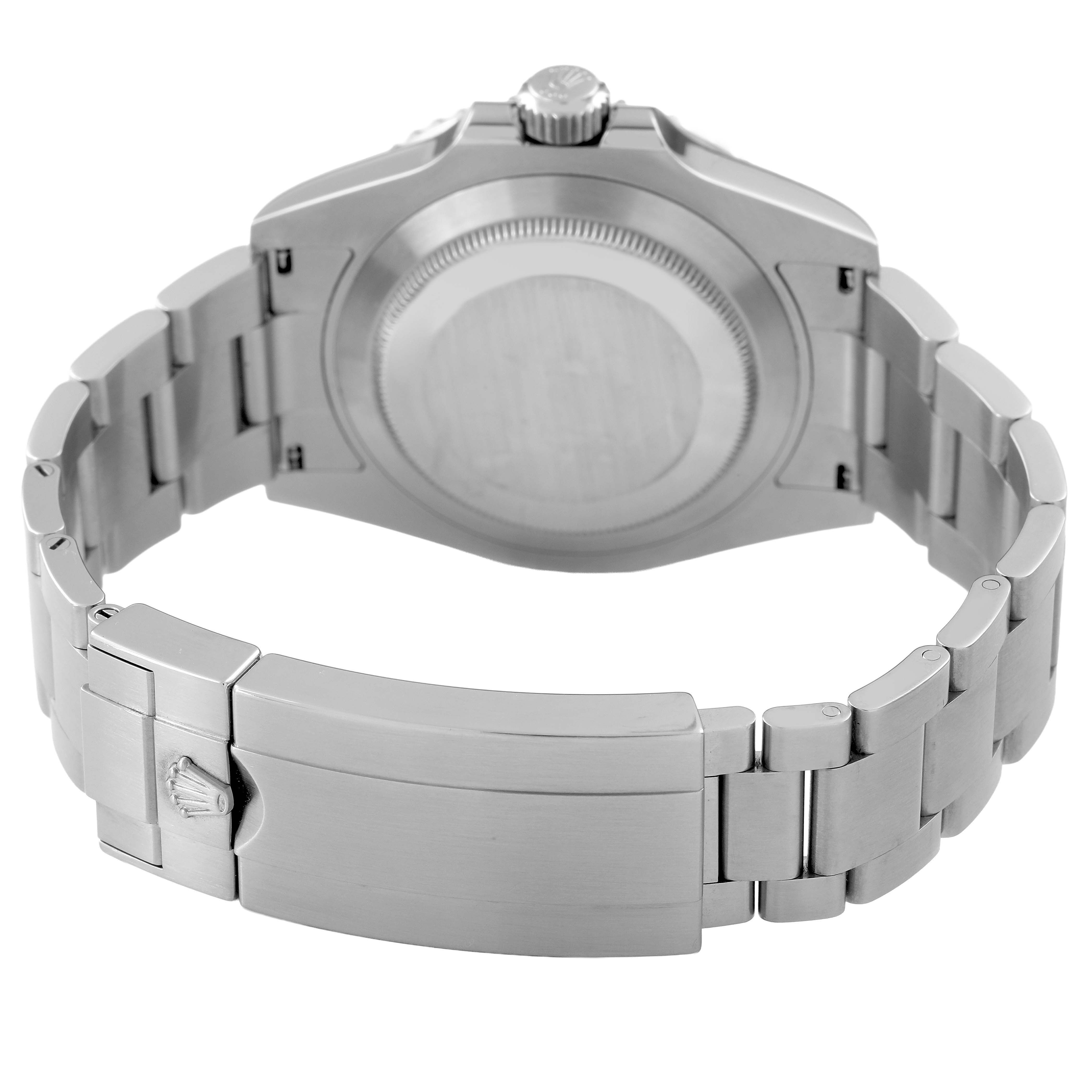 The image shows the back view of a Rolex Submariner M124060-0001 Men's Stainless Steel Black Dial watch, highlighting the case, crown, and bracelet with the clasp.