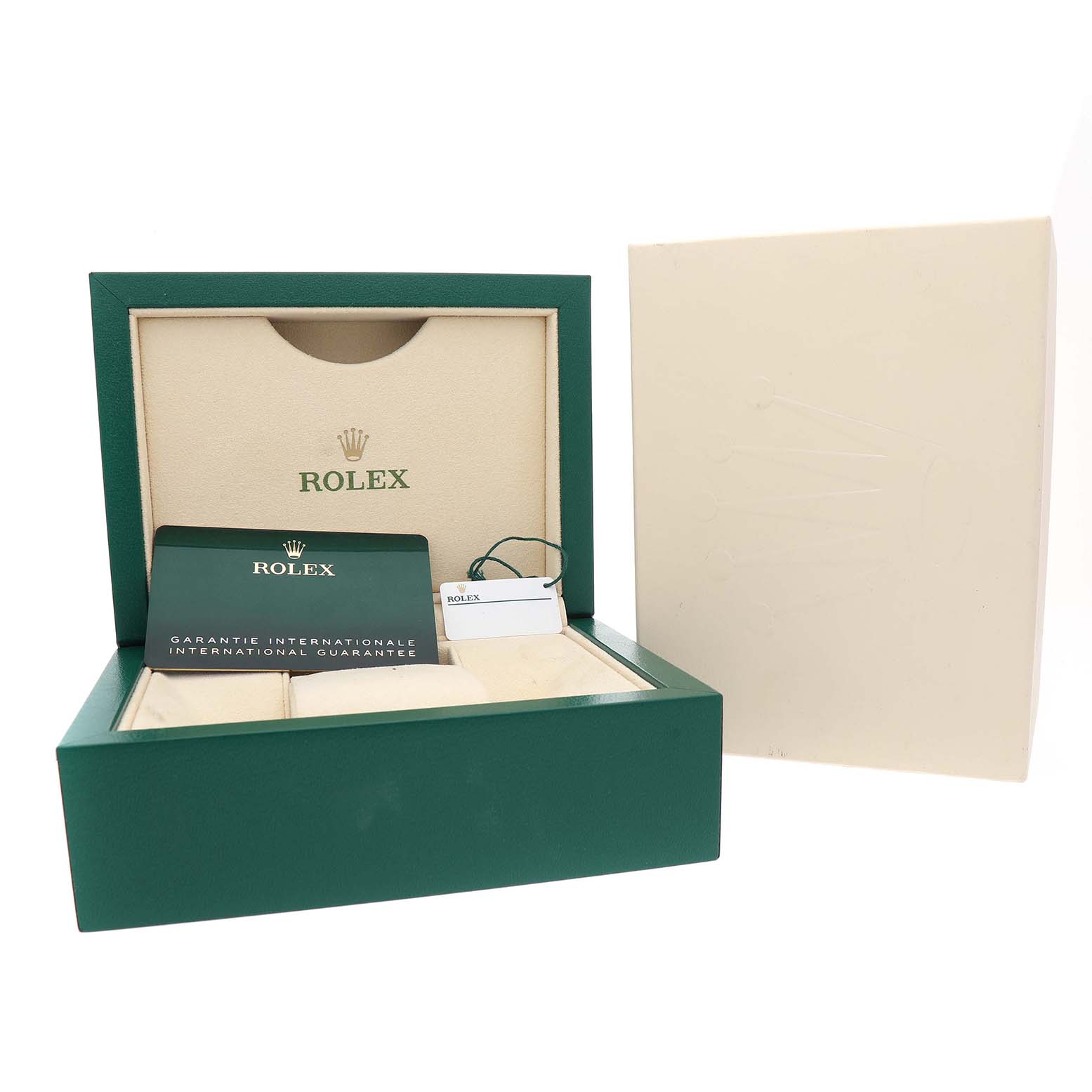 The image shows the packaging and accessories for a Rolex Submariner M124060-0001 Men's Stainless Steel Black Dial, including the box, warranty card, and tags.