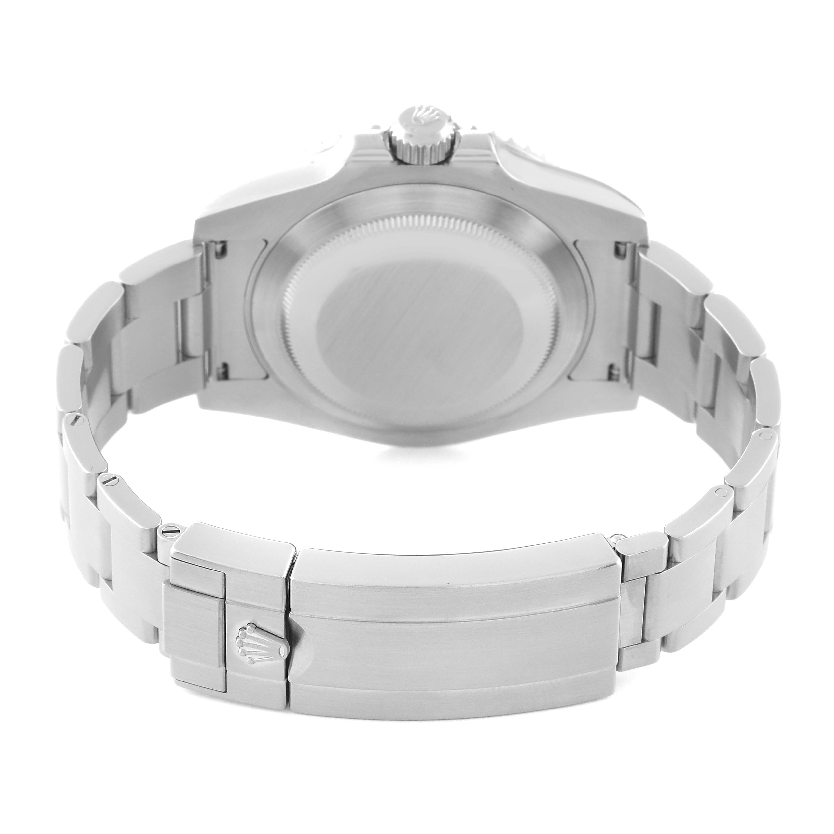 The image shows the back of the Rolex Submariner 116610LV Men's Stainless Steel Green Dial watch, highlighting its case back, bracelet, and clasp.