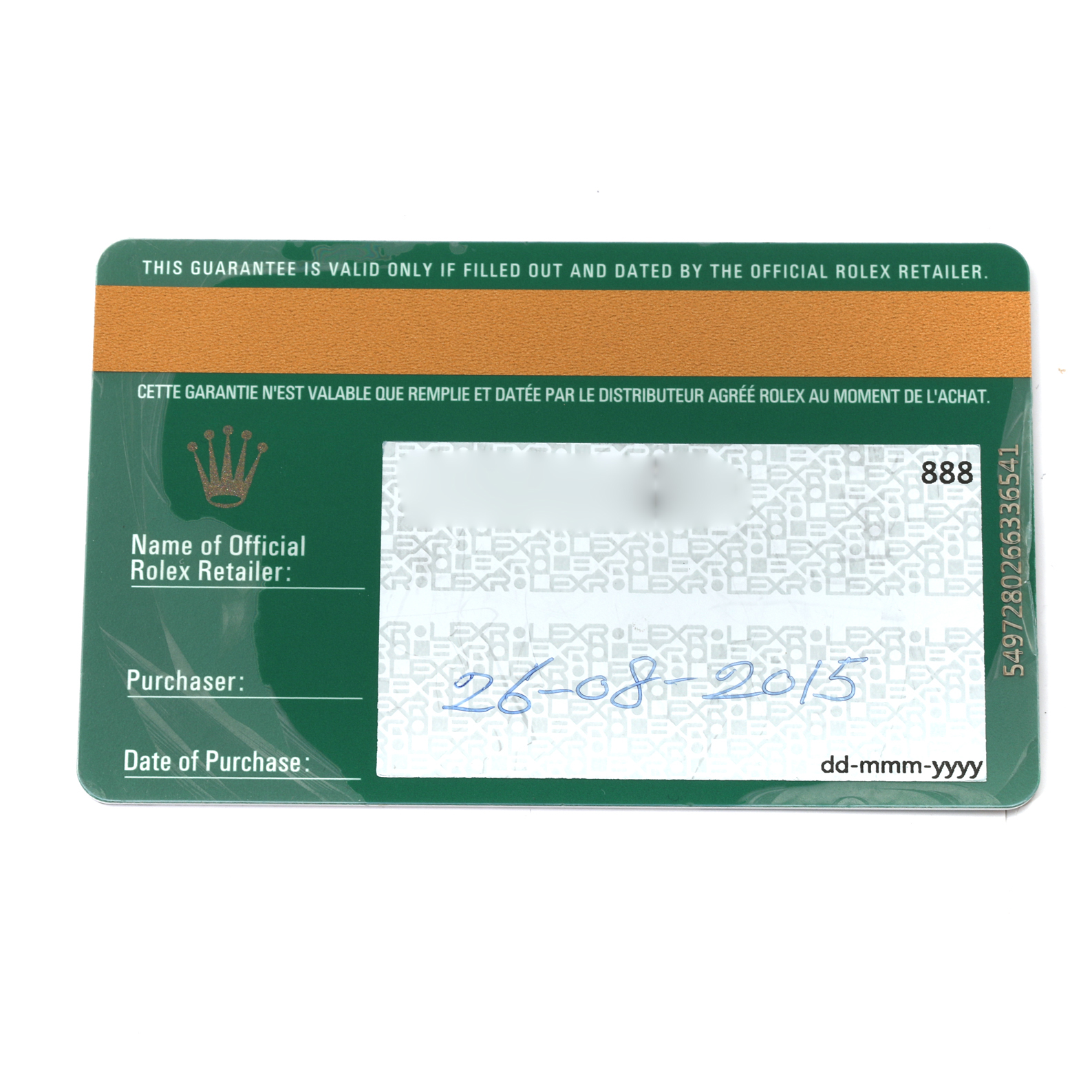 The image shows a Rolex warranty card, viewed from the top, associated with the Submariner model.