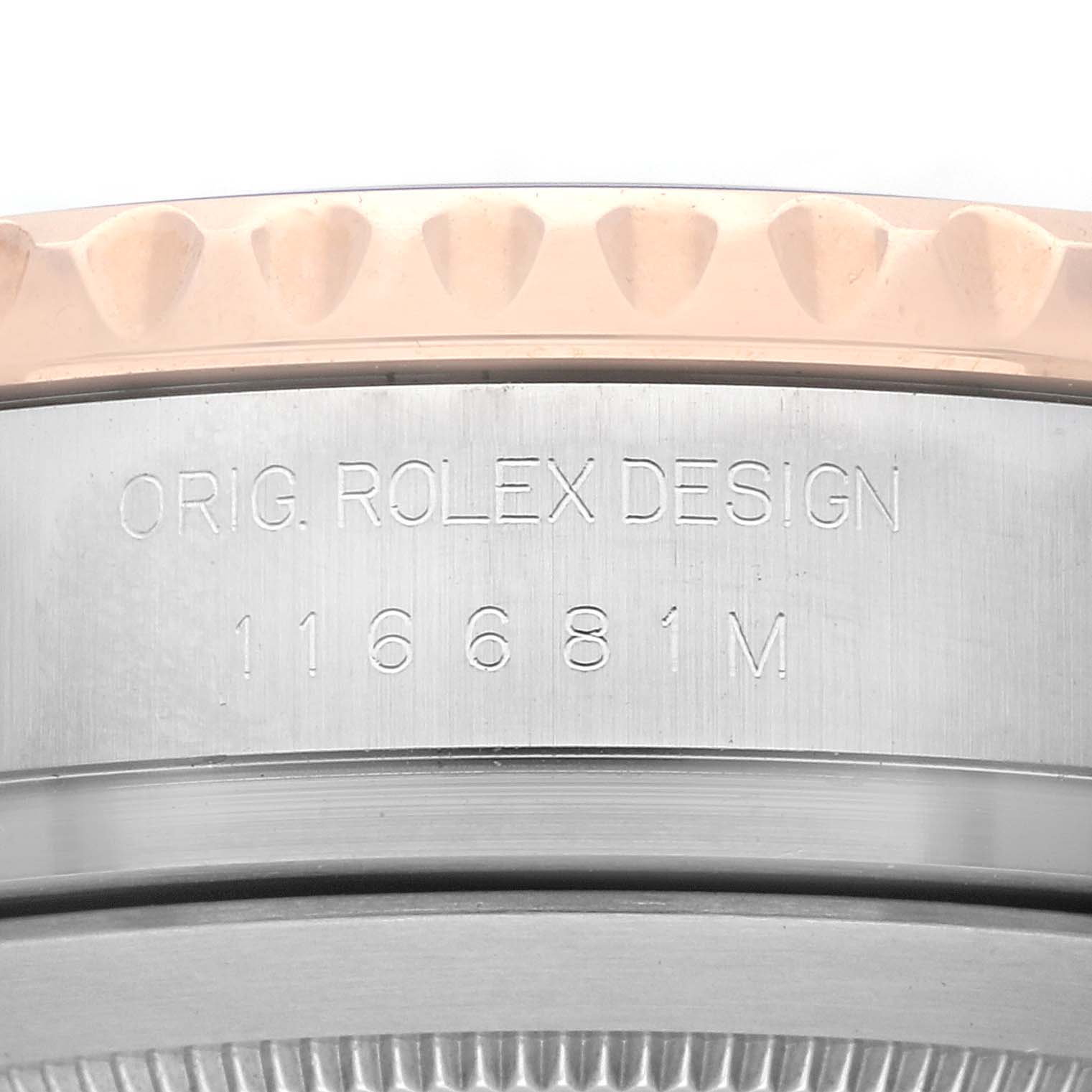 The image shows a close-up of the Rolex Yacht-Master 116681 Men
s Steel and Gold (two tone) White Dial 116681 Men
s Steel and Gold (two tone) White Dial case side, displaying the model number and "ORIG. ROLEX DESIGN" engraving.