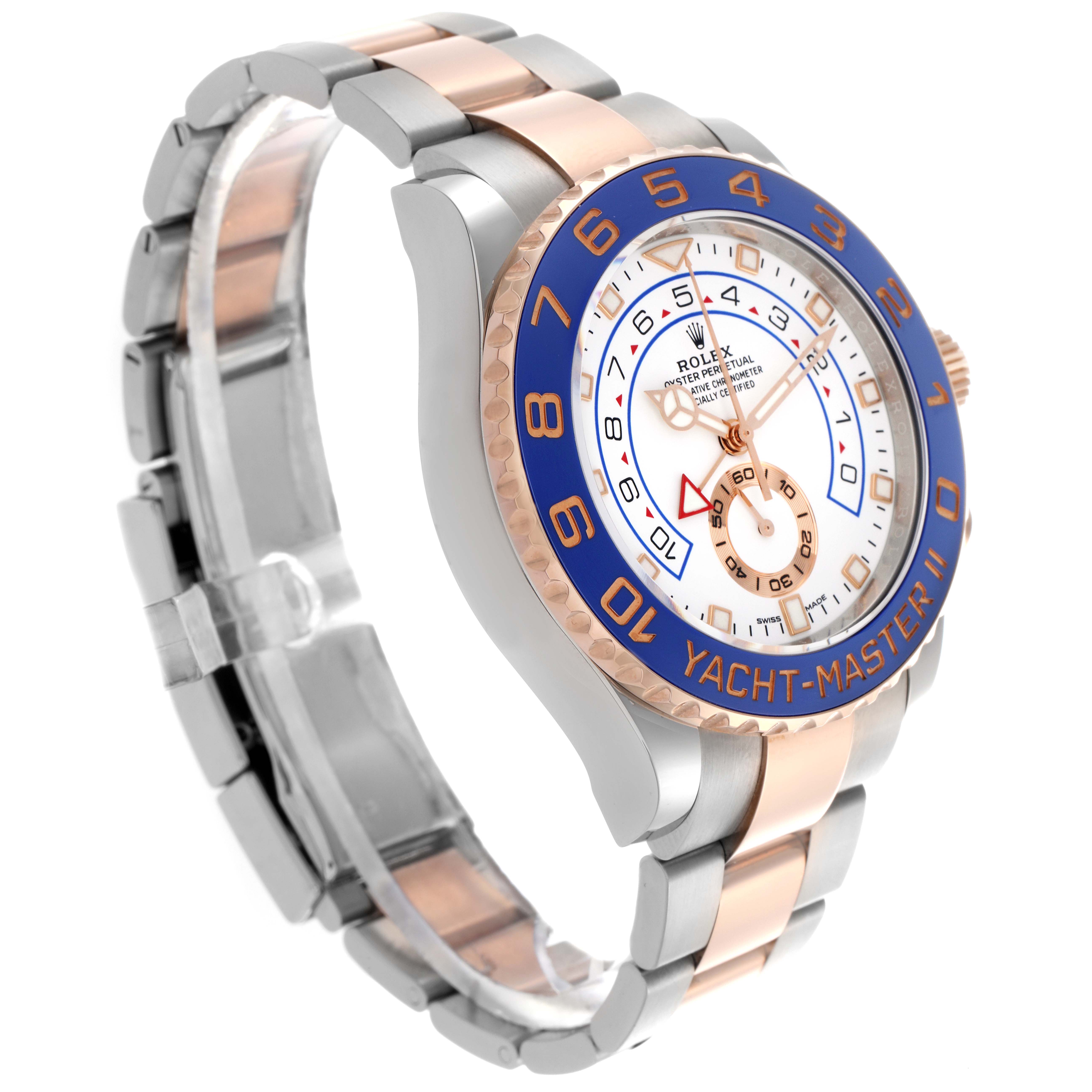 The Rolex Yacht-Master 116681 Men
s Steel and Gold (two tone) White Dial 116681 Men
s Steel and Gold (two tone) White Dial watch is shown at a three-quarter angle, displaying its dial, bezel, and bracelet.