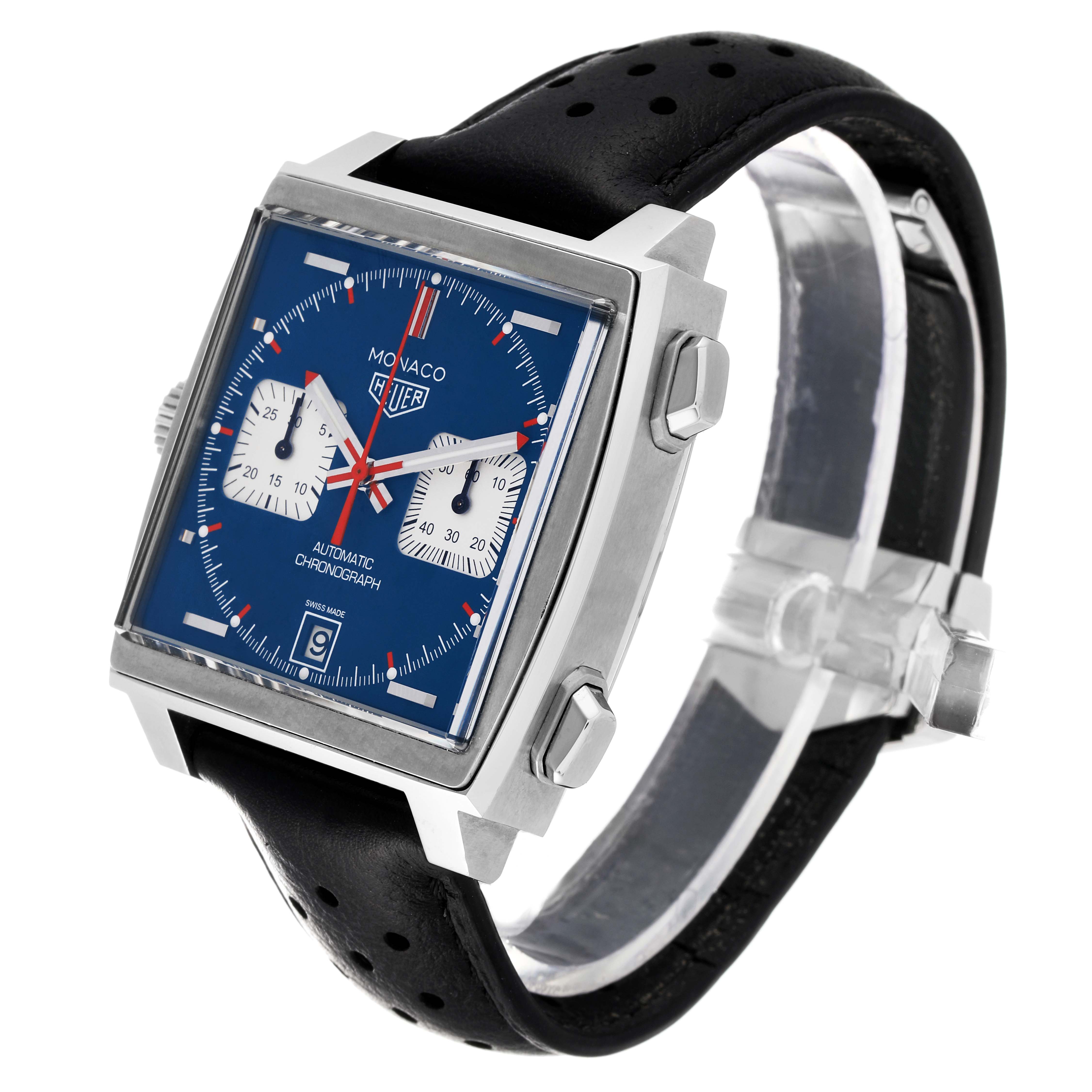 The image shows a Tag Heuer Monaco CAW211P.FC6356 Men's Stainless Steel Blue Dial CAW211P.FC6356 Men's Stainless Steel Blue Dial watch from a side angle, displaying its square blue dial, subdials, and perforated black strap.