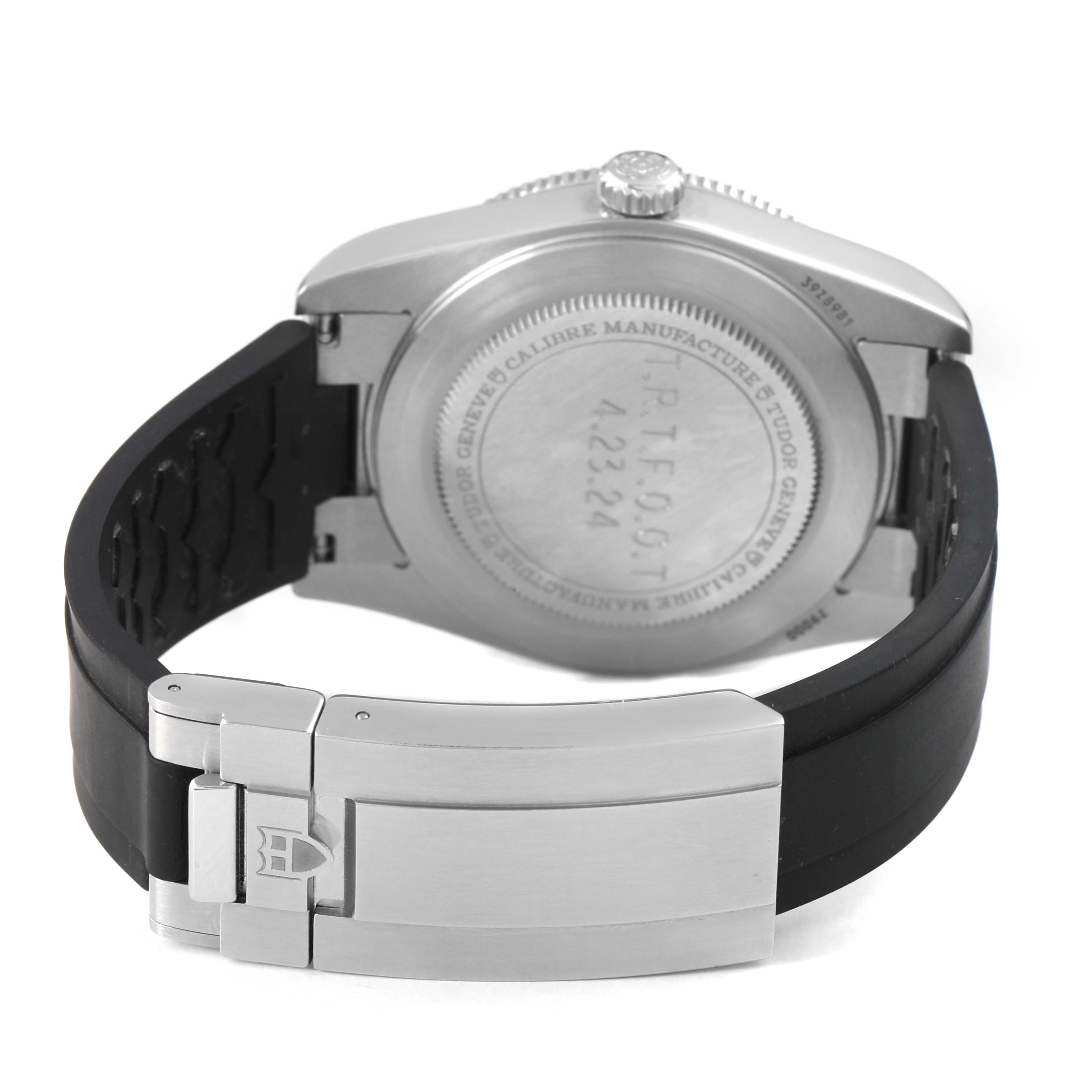 The image shows the back case and clasp of a Tudor Heritage Black Bay M79000N-0002 Men's Stainless Steel Black Dial watch, focusing on the bracelet and clasp.