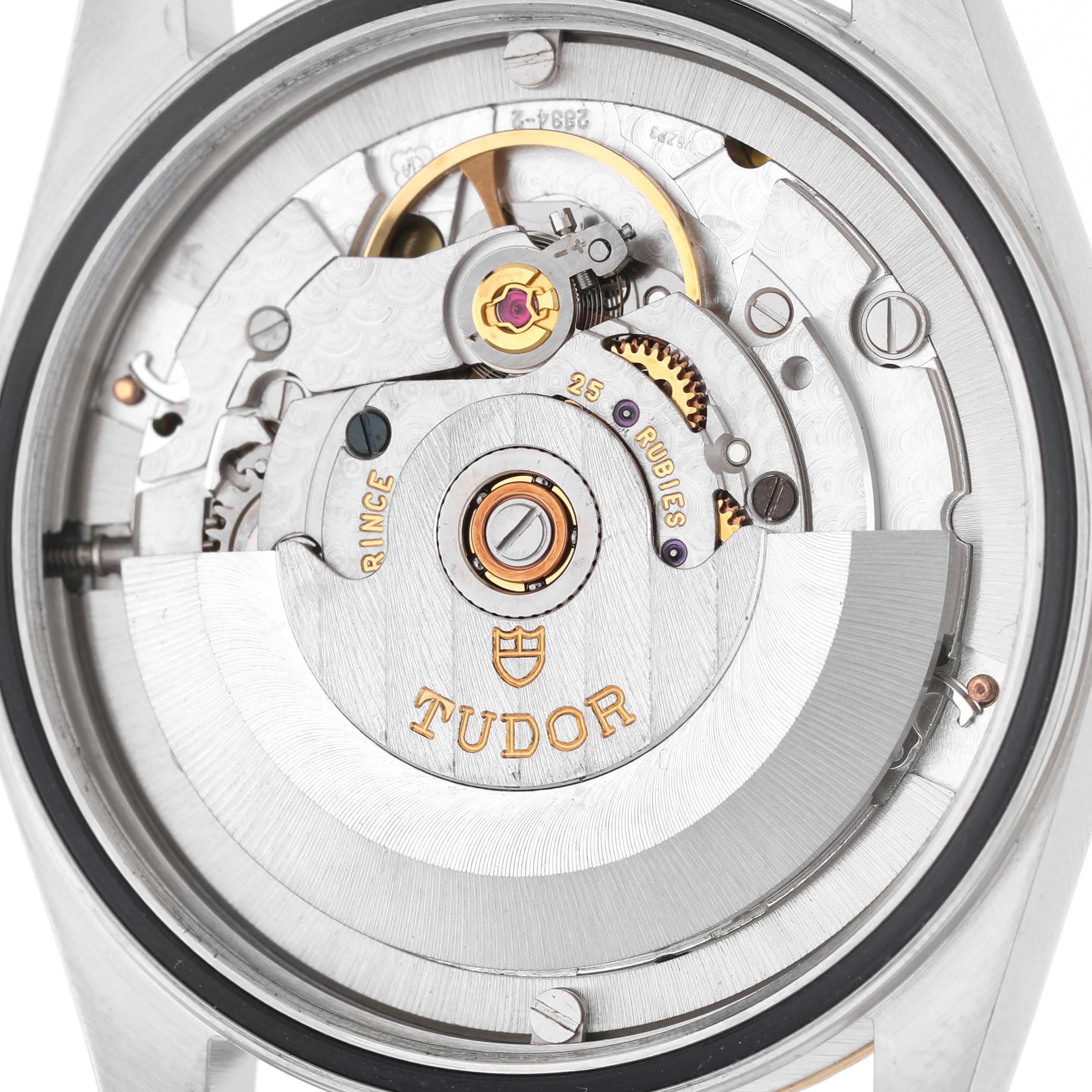 The image shows the movement of a Tudor Prince M76213 Men's Steel and Gold (two tone) Black Dial watch, highlighting the rotor and internal components from the back.