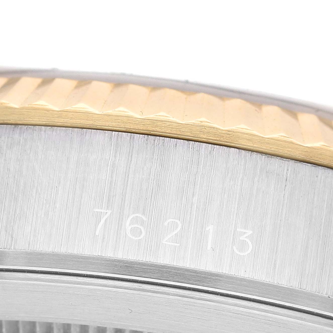 The image shows a close-up of the case side and bezel of the Tudor Prince M76213 Men's Steel and Gold (two tone) Black Dial watch, highlighting the model number 76213.