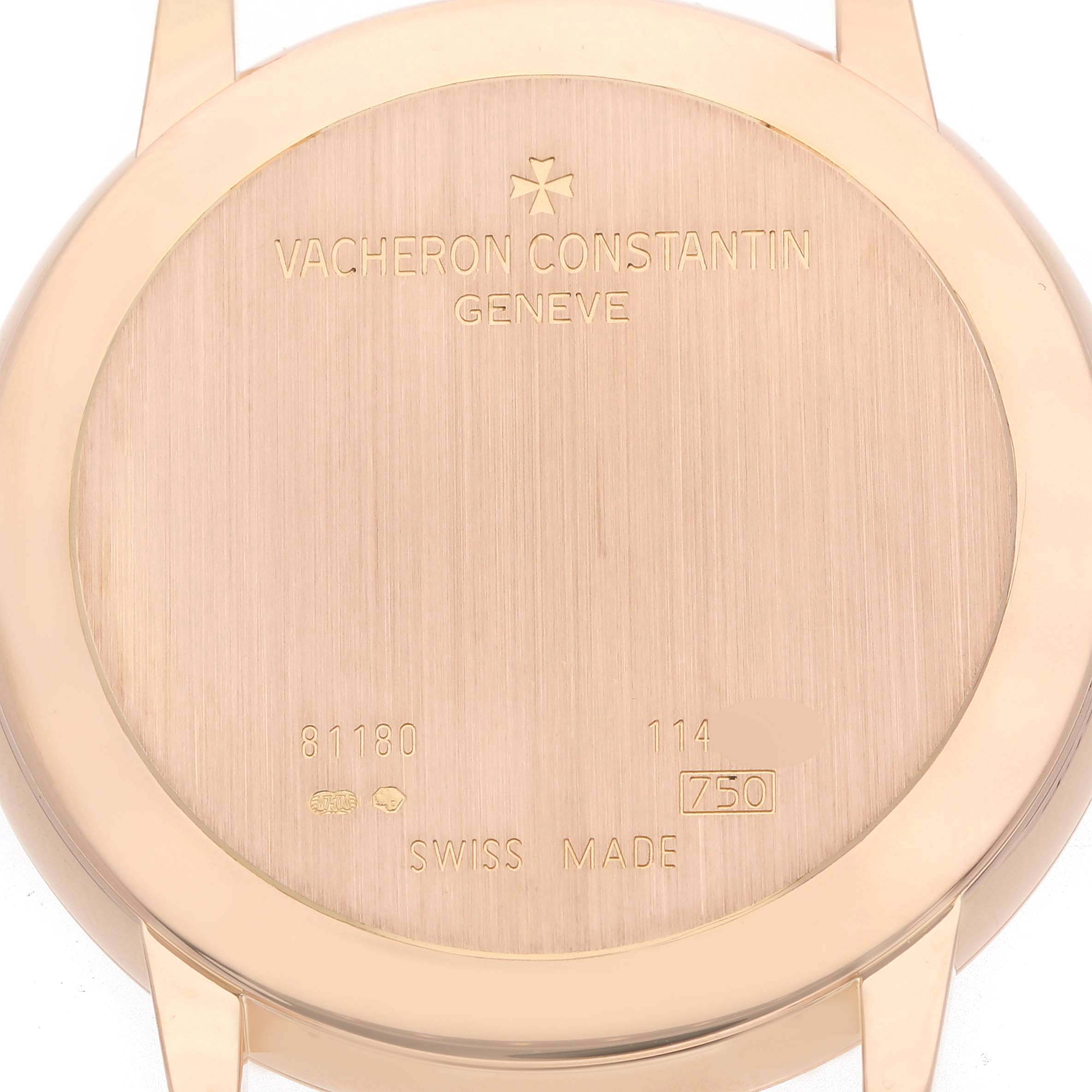 The image shows the back case of a Vacheron Constantin Patrimony 81180/000R-9159 Men's Rose Gold Silver Dial watch, displaying engravings and hallmark details.