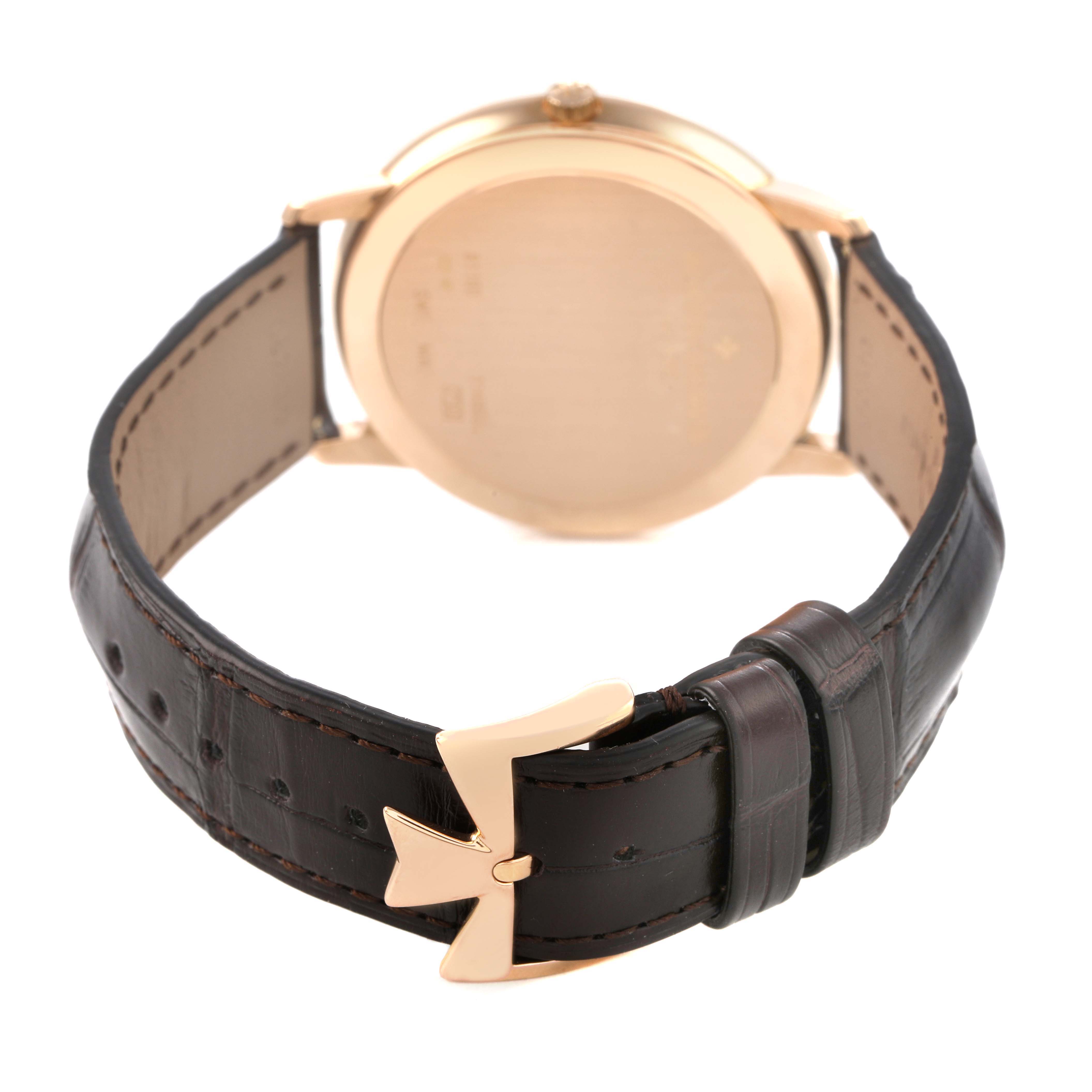 The image shows the back view of a Vacheron Constantin Patrimony 81180/000R-9159 Men's Rose Gold Silver Dial watch, highlighting its clasp and leather strap.