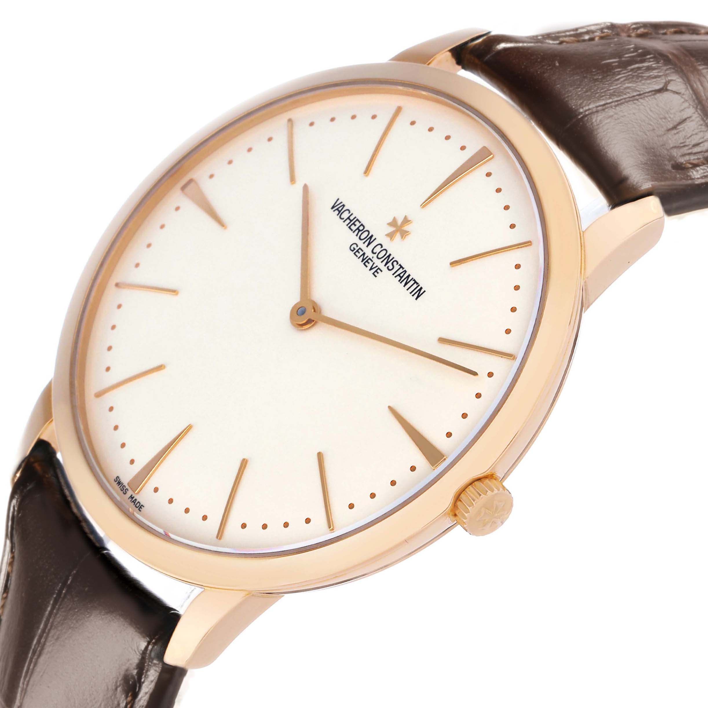 The image shows a Vacheron Constantin Patrimony 81180/000R-9159 Men's Rose Gold Silver Dial watch from a side angle, highlighting the face, crown, and leather strap connection.