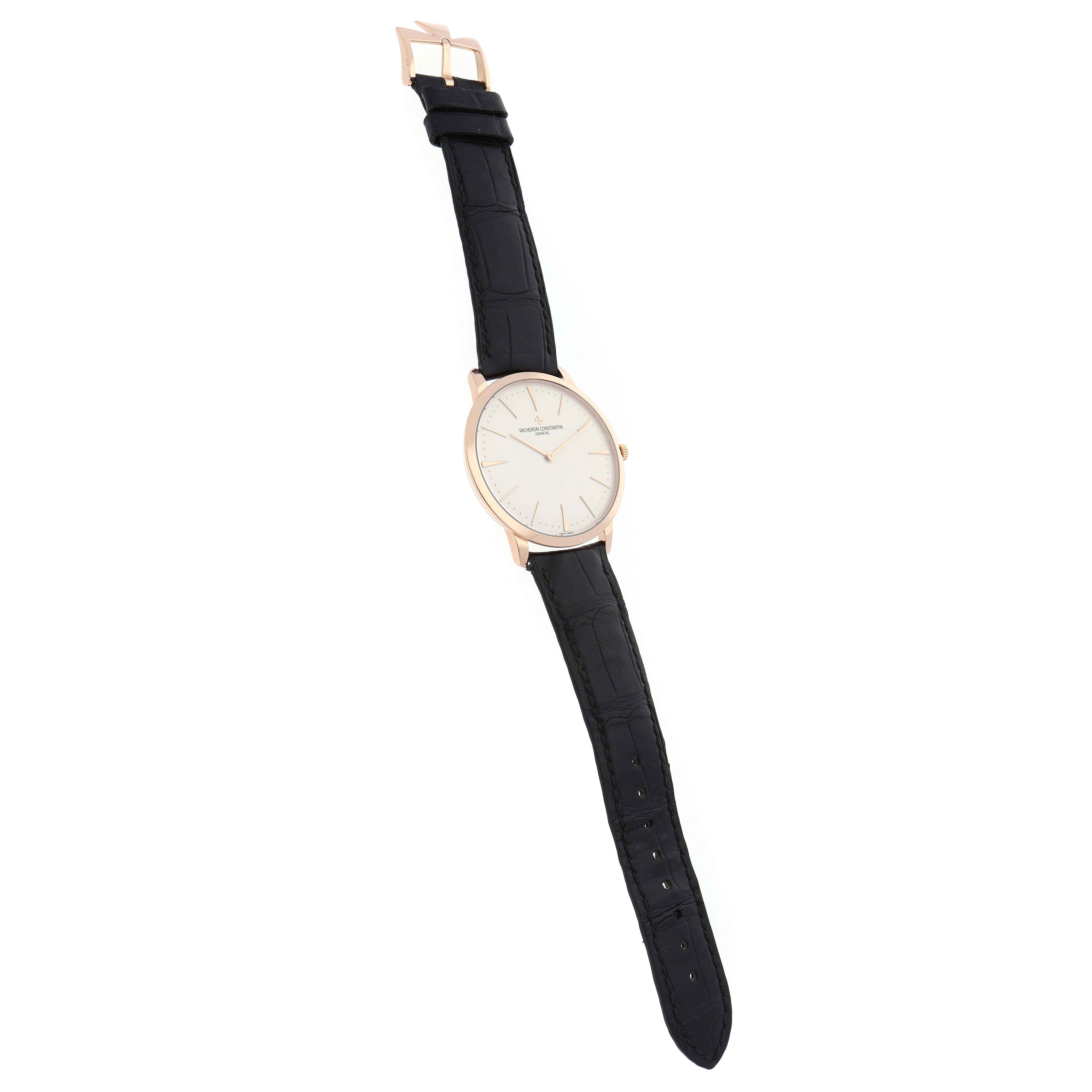 The Vacheron Constantin Patrimony 81180/000R-9159 Men's Rose Gold Silver Dial watch is shown at a slight angle, displaying its full face, case, crown, and leather strap.