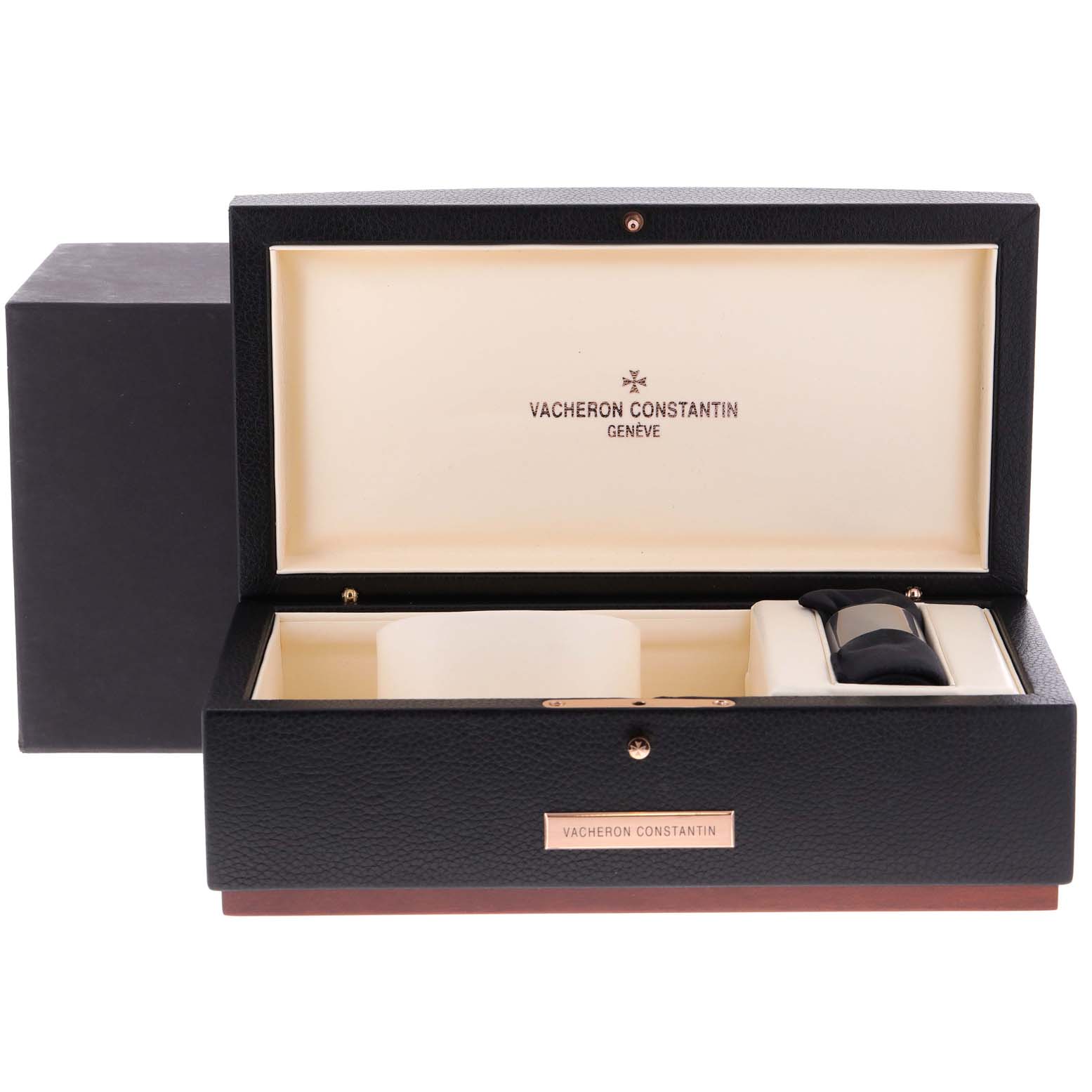This image shows an open presentation box for the Vacheron Constantin Quai de l'Ile watch, displaying compartments for watch storage.