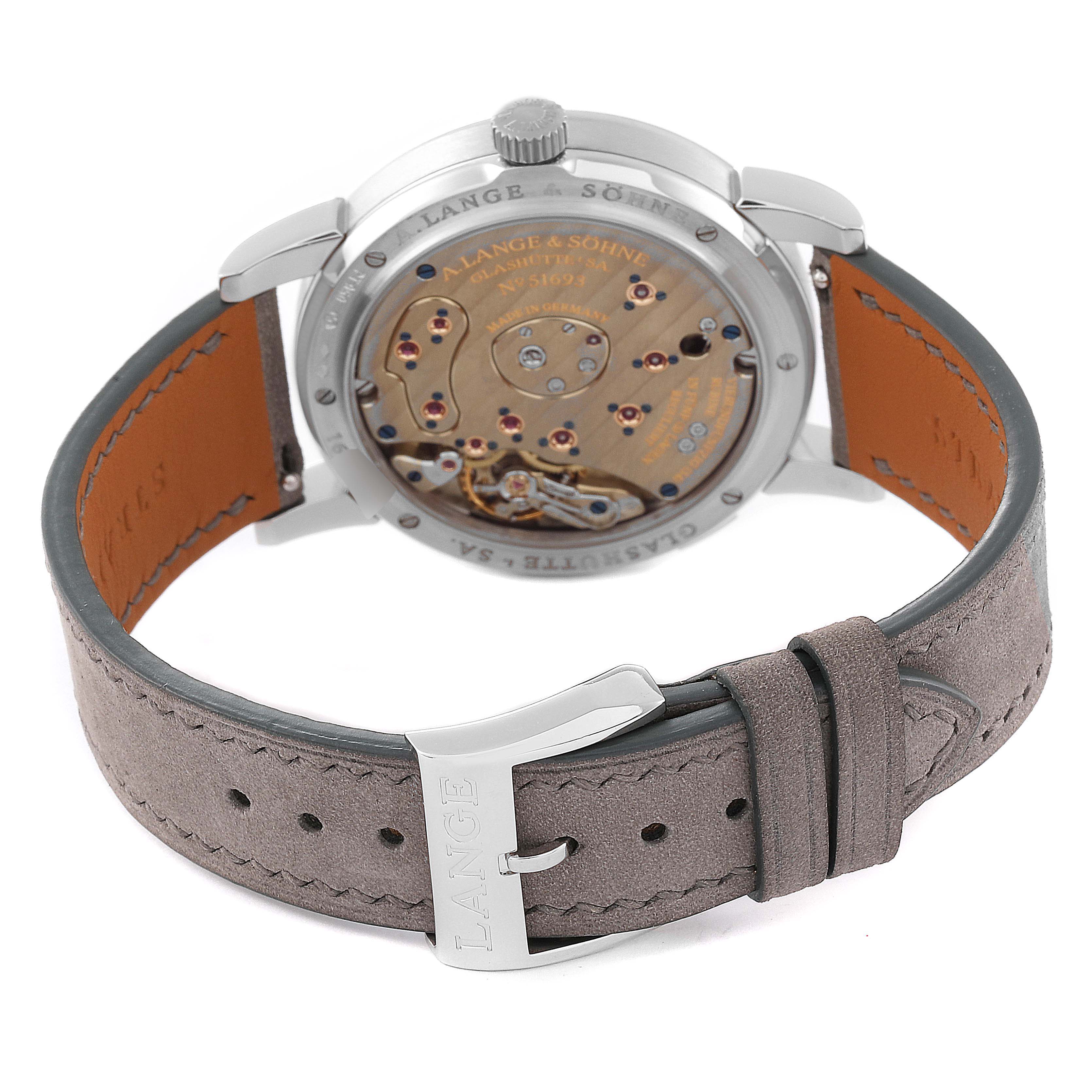 The Lange 1 model by A. Lange & Söhne is shown from the back, displaying its movement and leather strap.