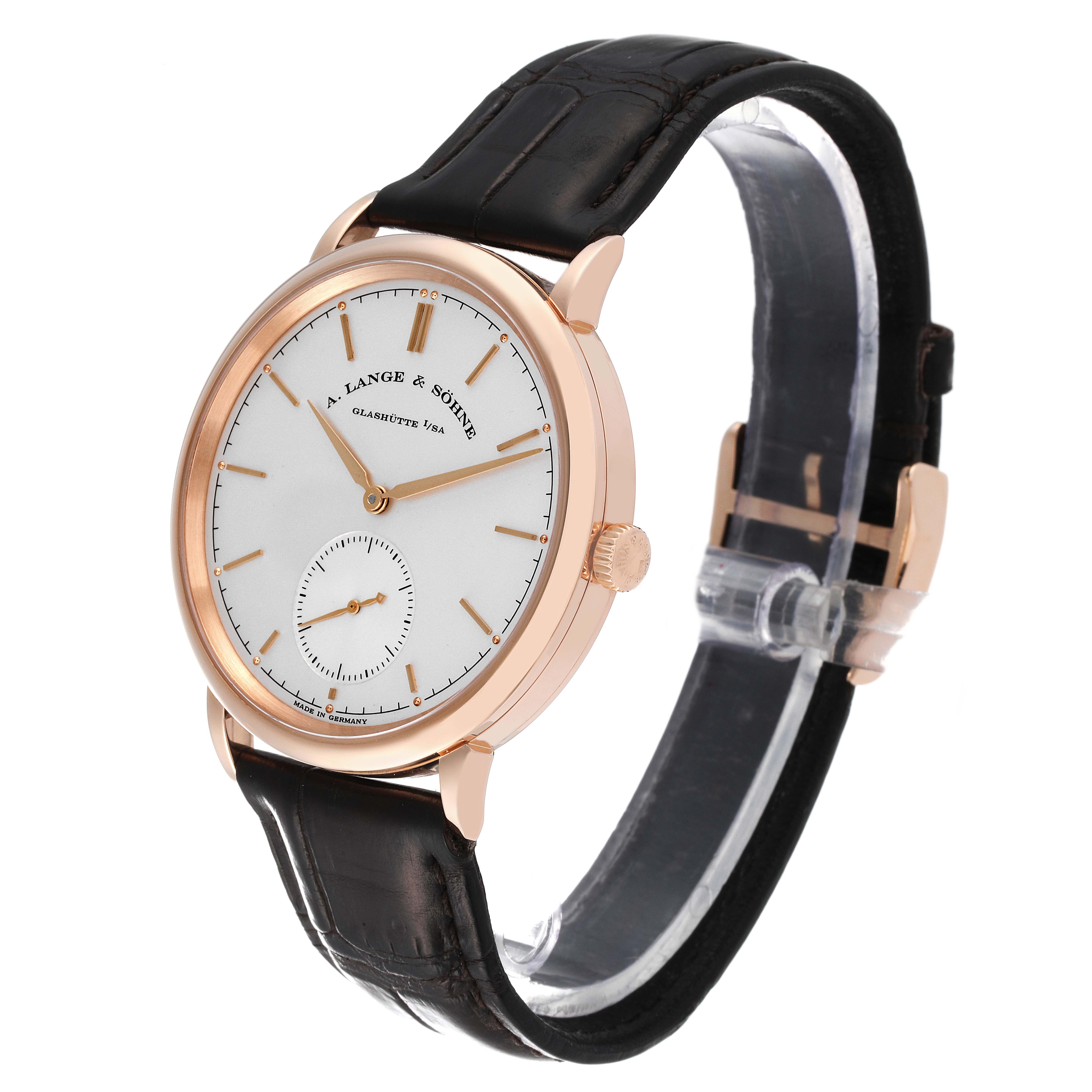 The Saxonia model by A. Lange & Söhne is shown at a slight angle, revealing the dial, crown, and part of the leather strap.