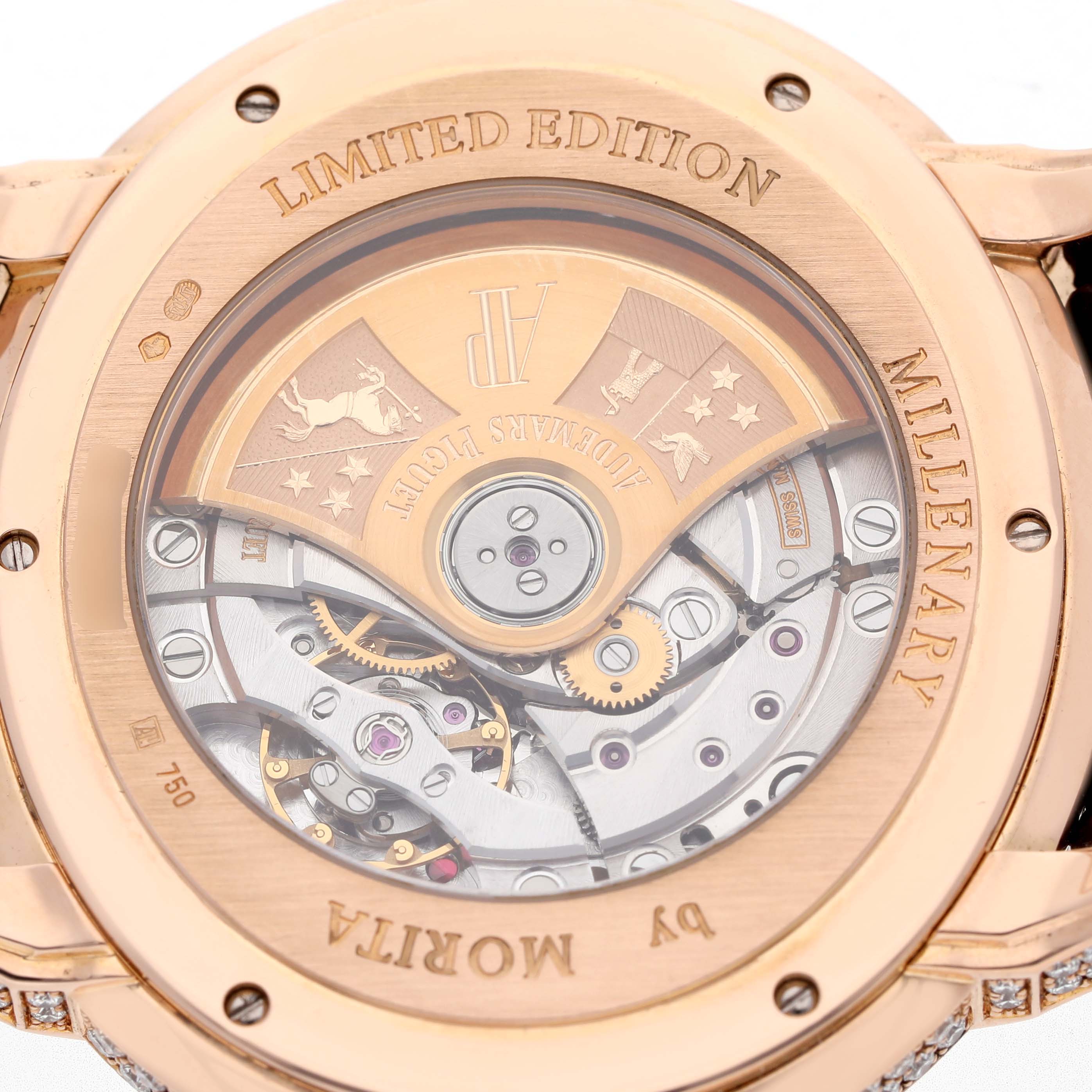 The image shows the back of the Audemars Piguet Millenary 15330OR.ZZ.D102CR.01 Women's Rose Gold Pink Dial watch, highlighting the intricate movement and engravings.