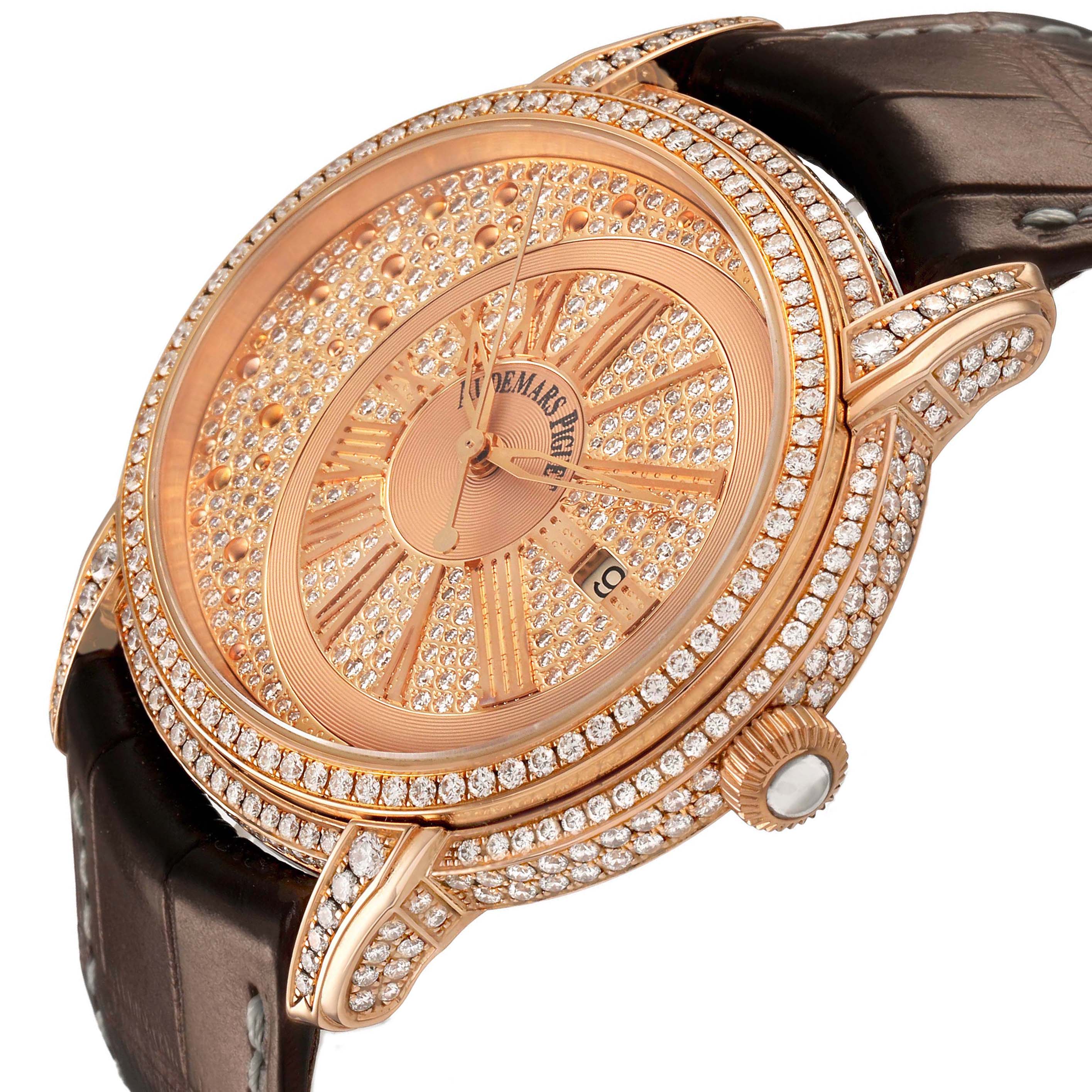 The Audemars Piguet Millenary 15330OR.ZZ.D102CR.01 Women's Rose Gold Pink Dial watch is shown at an angle emphasizing the diamond-encrusted dial, bezel, and lugs, with a brown strap and visible crown.