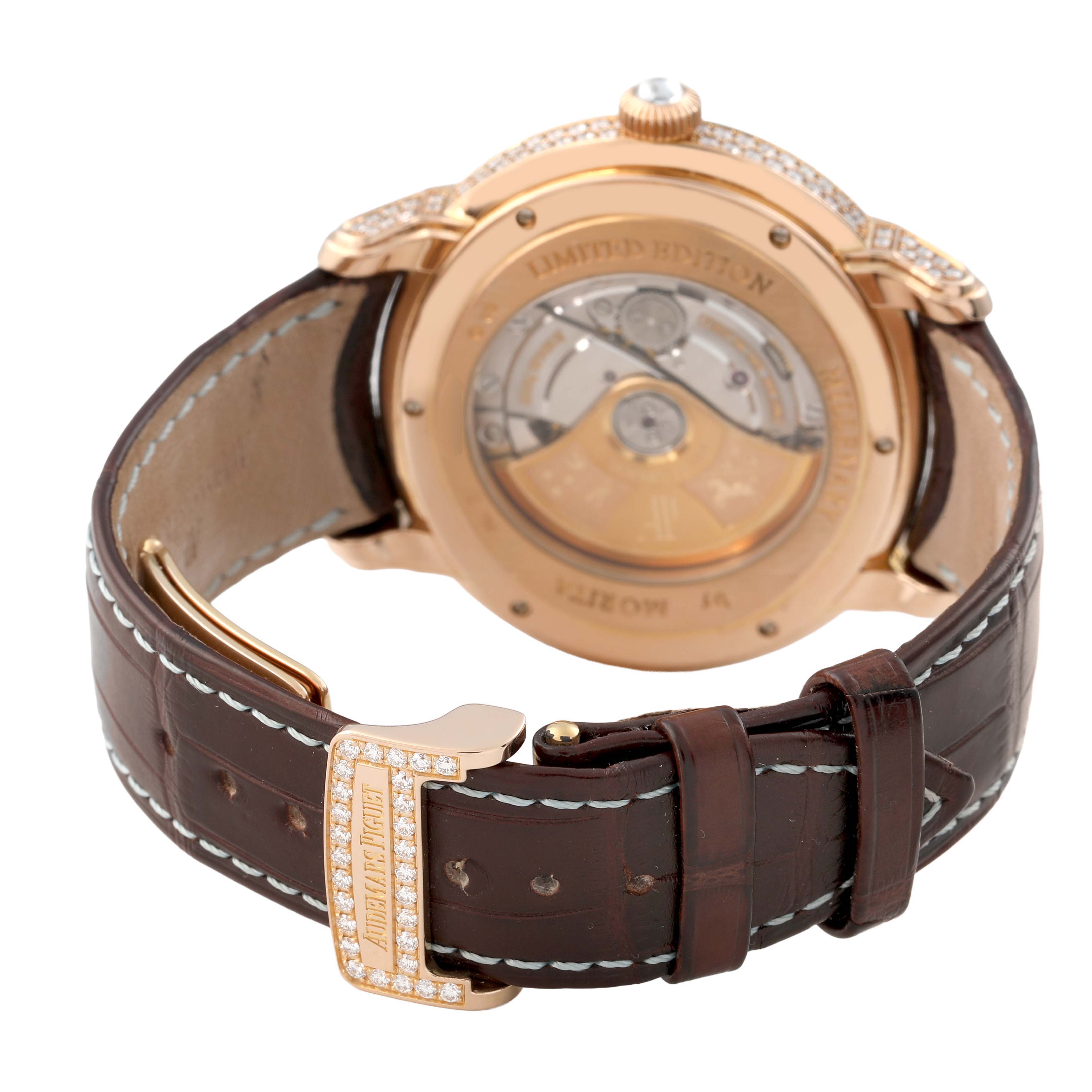 The image shows the back view of an Audemars Piguet Millenary 15330OR.ZZ.D102CR.01 Women's Rose Gold Pink Dial watch, including the movement and clasp on the leather strap.