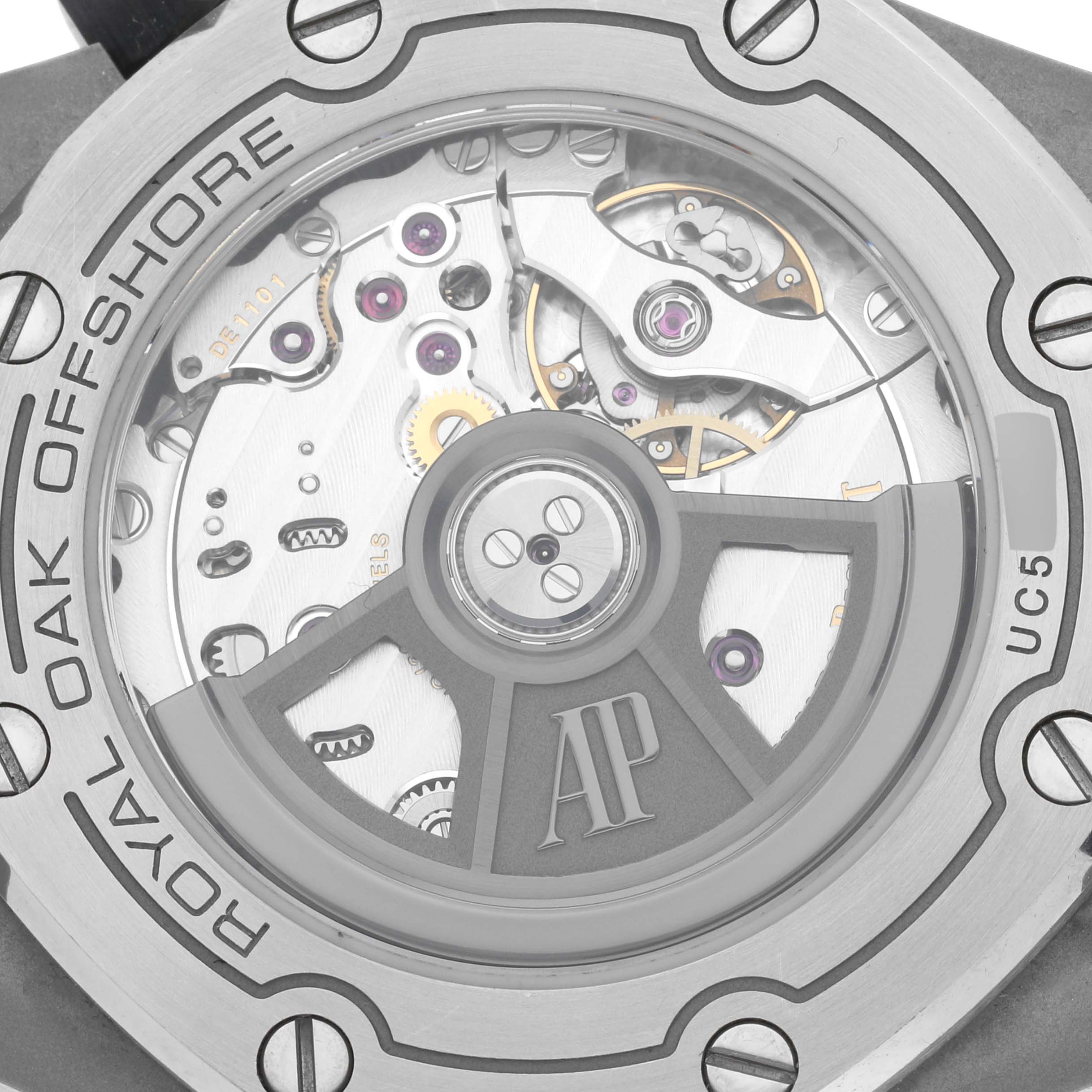 The image shows the back of the Audemars Piguet Royal Oak Offshore 15720ST.OO.A027CA.01 Men's Stainless Steel Blue Dial 15720ST.OO.A027CA.01 Men's Stainless Steel Blue Dial, highlighting its intricate movement and rotor.