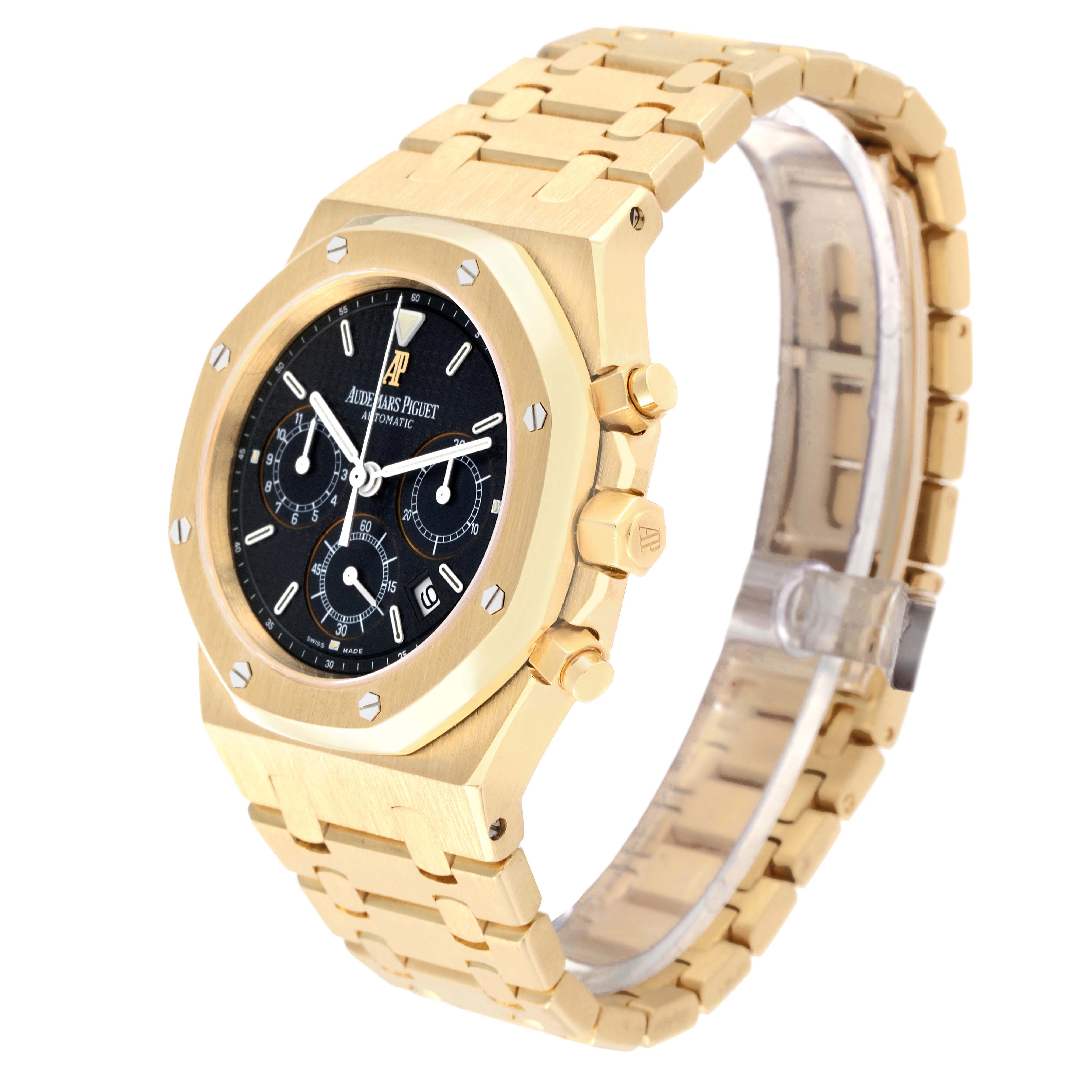 The image shows a side angle of the Audemars Piguet Royal Oak 25860BA.OO.1110BA.01 Men's Yellow Gold Black Dial 25860BA.OO.1110BA.01 Men's Yellow Gold Black Dial watch, highlighting its face, bezel, crown, pushers, and bracelet.