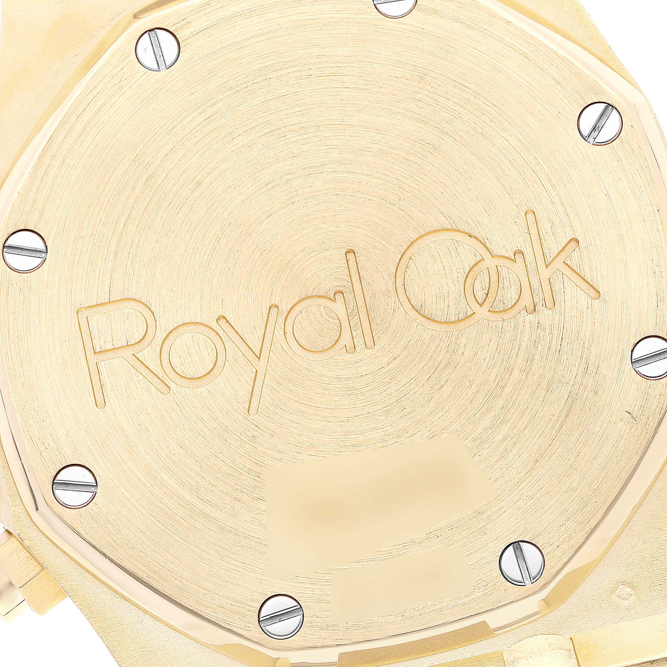 The image shows the back casing of the Audemars Piguet Royal Oak 25860BA.OO.1110BA.01 Men's Yellow Gold Black Dial 25860BA.OO.1110BA.01 Men's Yellow Gold Black Dial watch, prominently featuring the "Royal Oak" engraving.