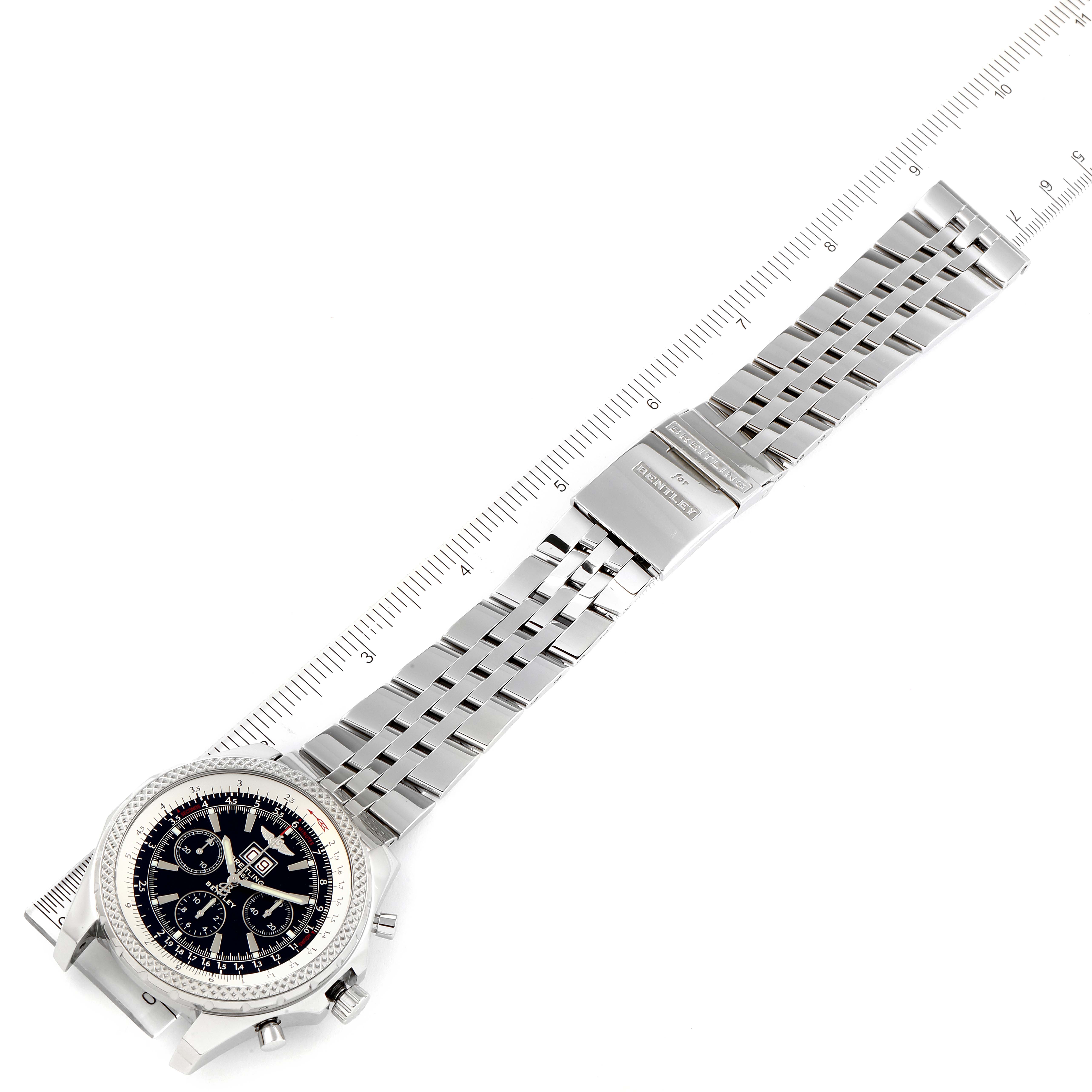 The Bentley model by Breitling is shown lying flat with a full view of the watch face and metal bracelet.