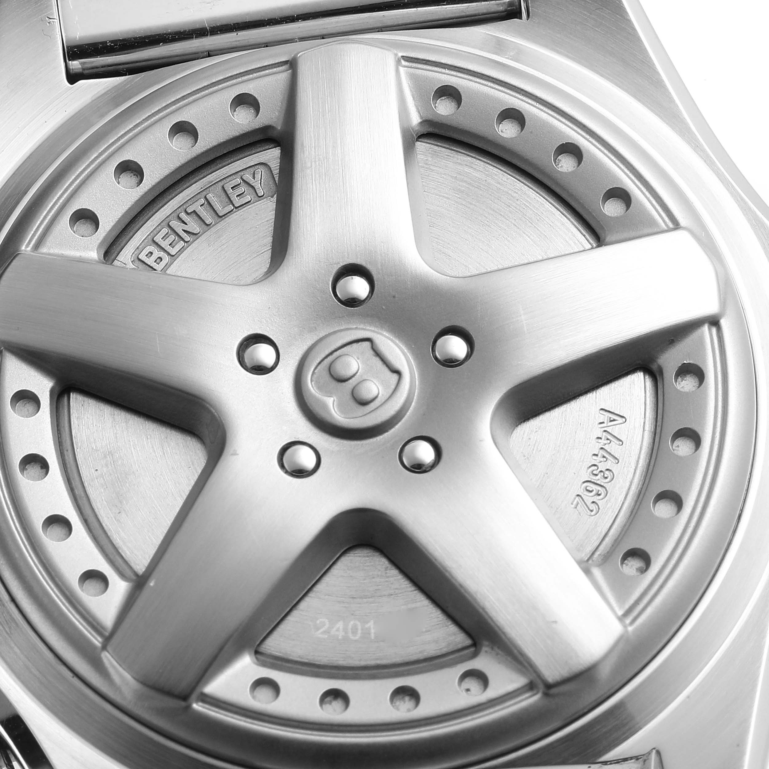 The image shows a close-up of the Bentley model by Breitling, focusing on its detailed case back.