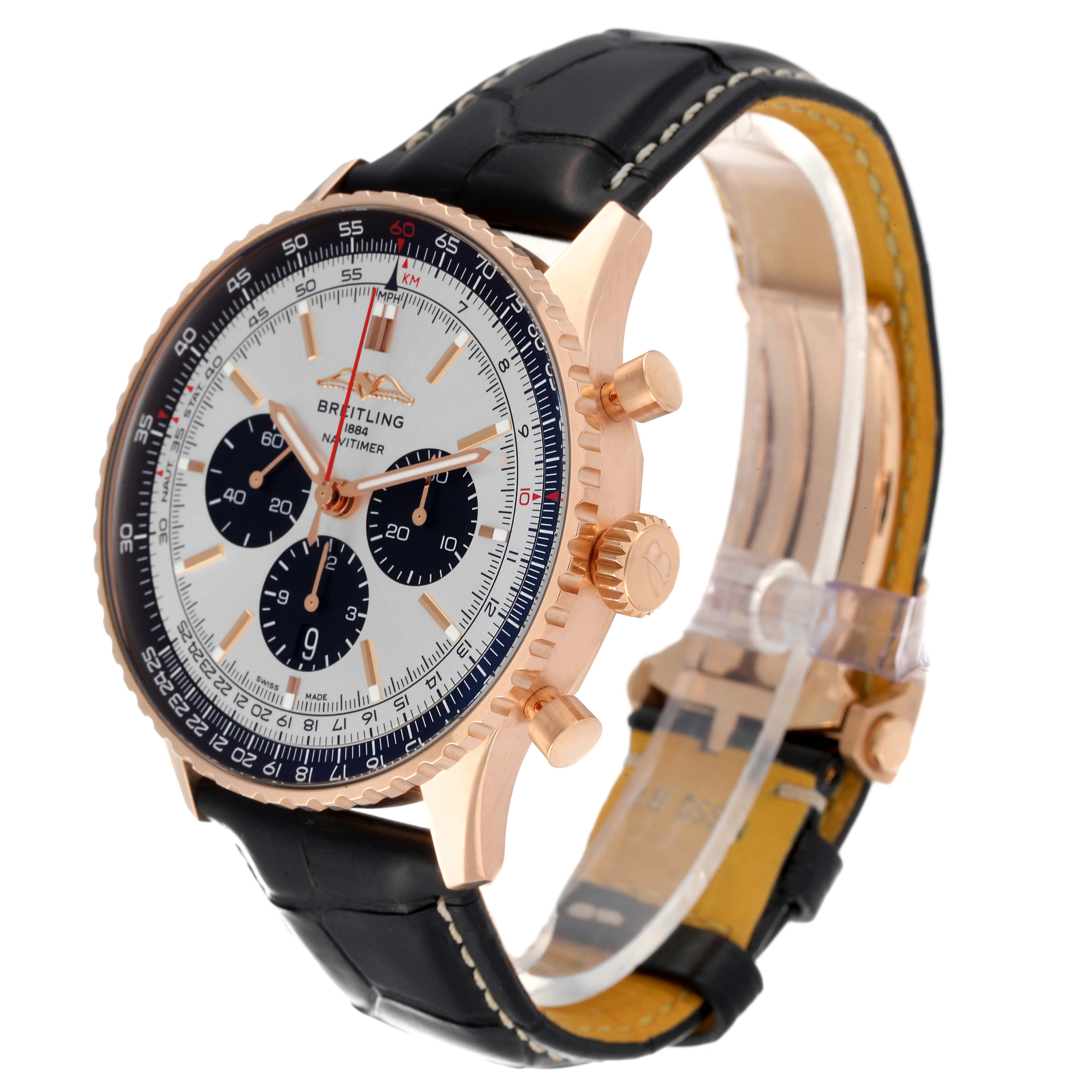 The Breitling Navitimer RB0137 Men's Rose Gold Silver Dial RB0137 Men's Rose Gold Silver Dial watch is shown at an angle displaying its face, gold case, knobs, and black leather strap.
