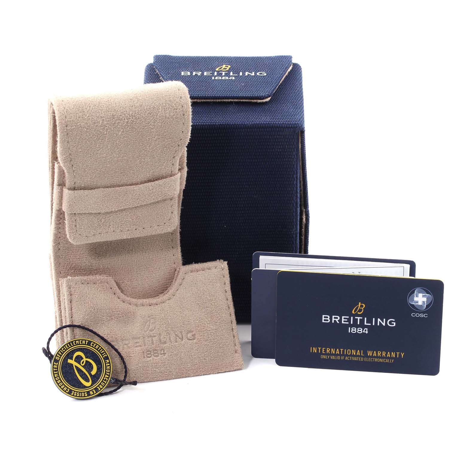 This image shows a Breitling Navitimer RB0137 Men's Rose Gold Silver Dial RB0137 Men's Rose Gold Silver Dial watch box and accessories including a beige travel pouch, international warranty card, and tag.