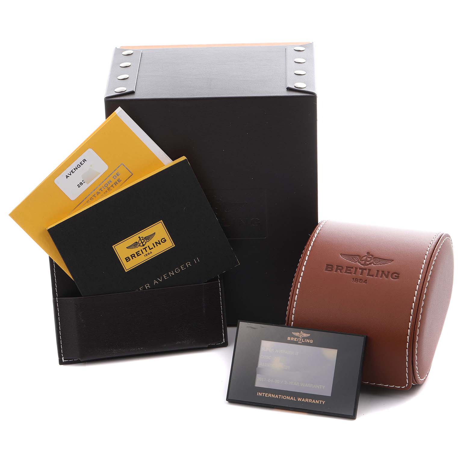 The image shows the Breitling Avenger A1337111/BC29 Men
s Stainless Steel Black Dial A1337111/BC29 Men
s Stainless Steel Black Dial watch accessories, including boxes, manuals, and warranty card from a front angle.